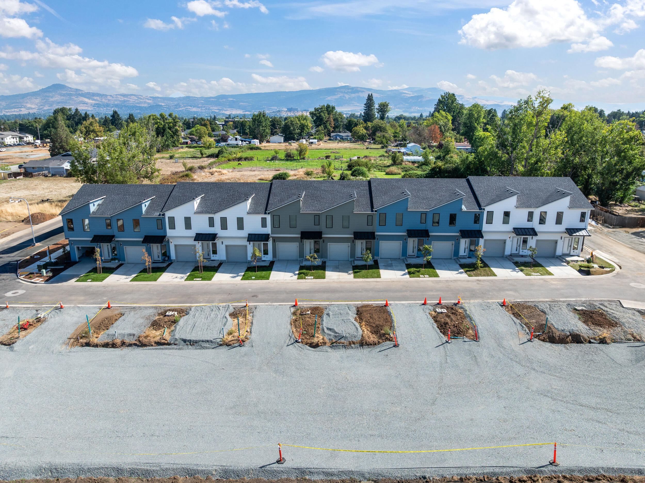 Welcome to Sunwood Addition, West Medford's newest townhome community. Phase One includes 10 beautifully designed townhomes built by Olaf & Company, LLC, and with only 9 left, now is the time to act. Units are move-in ready now, and our model home is open for tours so you can see the quality and layout for yourself. Each townhome offers three bedrooms, two and a half bathrooms, and 1,300 square feet of open-concept living space filled with natural light and modern, high-end finishes including a stylish kitchen perfect for daily living and entertaining. Located in a desirable West Medford neighborhood, Sunwood Addition offers convenient access to schools, parks, and local amenities. With only 9 townhomes remaining in Phase One, this opportunity won't last. Contact us today to schedule your tour.
