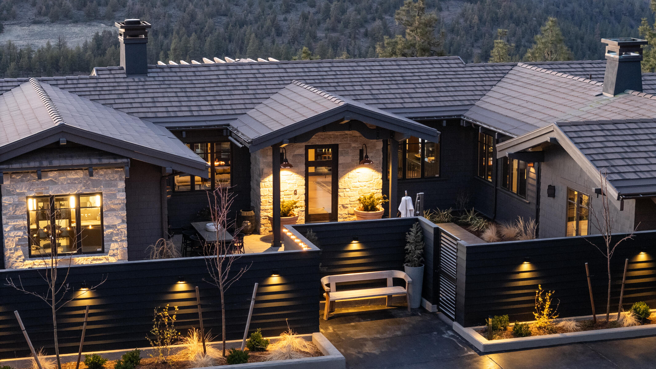 Exquisite North Rim residence showcasing panoramic Cascade Mountain views.  This incredible home has been extensively renovated and upgraded with a meticulous eye towards craftsmanship and quality of finishes and materials.  Experience comfort and relaxation in the primary bedroom wing boasting a cozy sitting area, stunning views, and a luxurious bathroom designed for both functionality and serenity.  An abundance of natural light in the great room with french door access to the expansive elevated deck.  The morning Alpenglow and evening sunsets will leave you breathless.  Incredible designer kitchen, butler pantry, den/office, and guest room with ensuite bath round out the main level.  Lower level includes 2 Beds/2 Baths, game/tv room, and bonus flex room, all with access to the beautiful & spacious halfmoon rear patio.  1,100 sqft private front courtyard with soothing fountain and welcoming hot tub/spa with a dedicated view of North Sister. 3-Car garage with heated driveway.