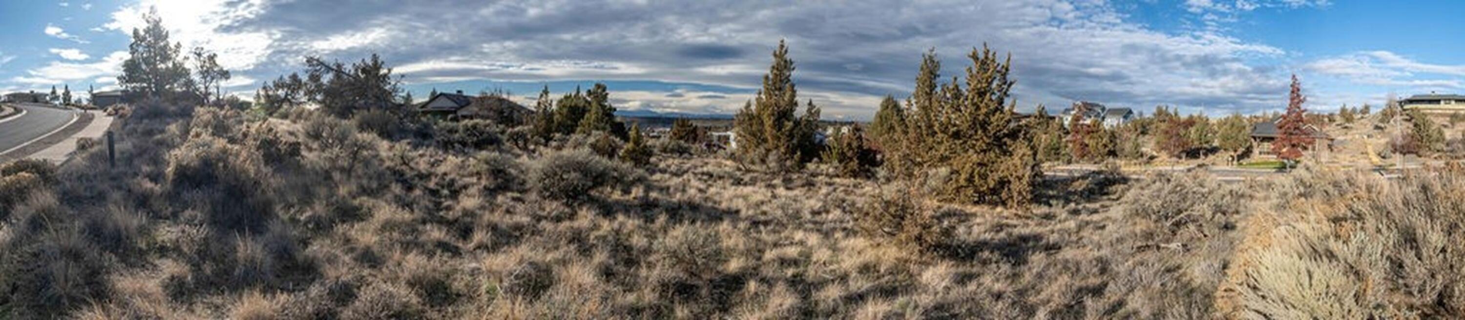 Don't miss this rare opportunity to build your custom home in the highly desirable Yarrow neighborhood of Madras. This spacious .39-acre double lot offers grand territorial and mountain views, providing an ideal setting for a future home designed to take full advantage of Central Oregon's natural beauty. Located in one of Madras' most thoughtfully planned communities, this property offers a quiet residential feel while remaining close to parks, trails, schools, medical services, shopping and the Swim Center. With generous dimensions, the double lot allows ample room for a variety of home styles, outdoor living areas, gardens or additional structures (buyer to verify). This is a prime opportunity to secure two unobstructed view lots in one of Madras' most sought-after locations. Bring your builder and your vision for this gorgeous double lot.