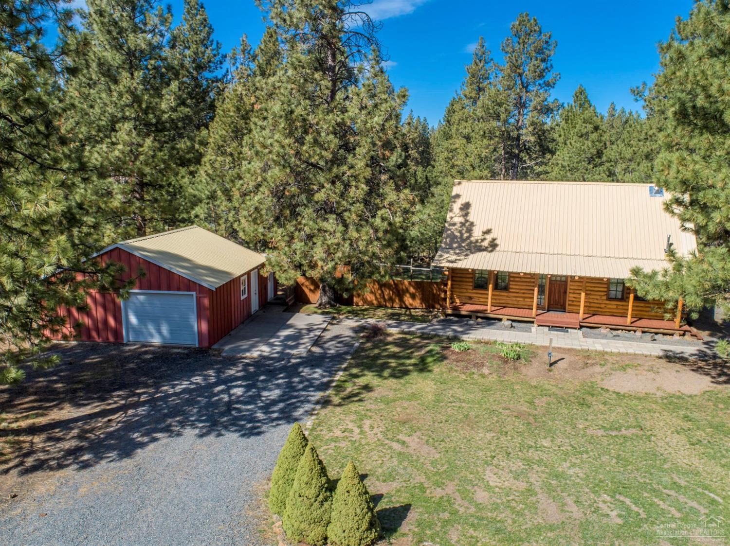 Cute little log home that is getting a new face lift on the exterior. One of the larger lots in Deschutes River Woods, 1.3 acre lot with nice detached shop/garage. Newer back deck. Don't miss this one! Priced to sell.
