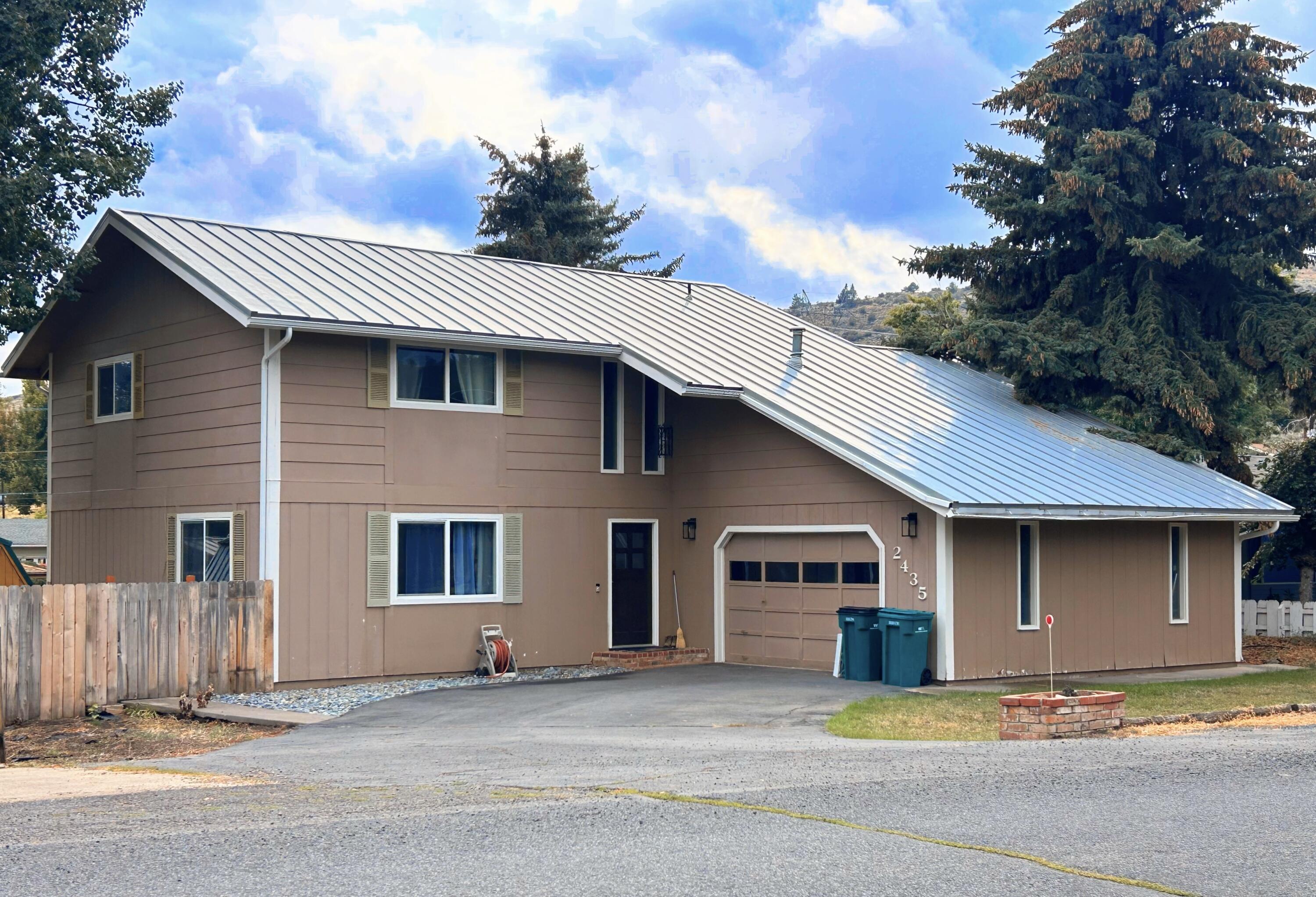Incredible opportunity to possibly assume this FHA loan at 2.875% on the first $260,000. This charming contemporary northwest style home is located in West Hills, conveniently close to downtown, OIT and the hospital. 3 large bedrooms including a primary with en suite bath, and 2.5 bathrooms. You'll enjoy a back patio entering a fenced and private backyard and gardening space. This two story home has over 2000 square feet of living space and an attached 2 car garage. Downstairs features a formal dining room with bar seating in the kitchen, a living room and family room, and a laundry room. Forced air heating and cooling provide comfort year round. Call your lender to discuss your options on assuming this FHA loan at an incredible 2.8% interest on the first $260,000.