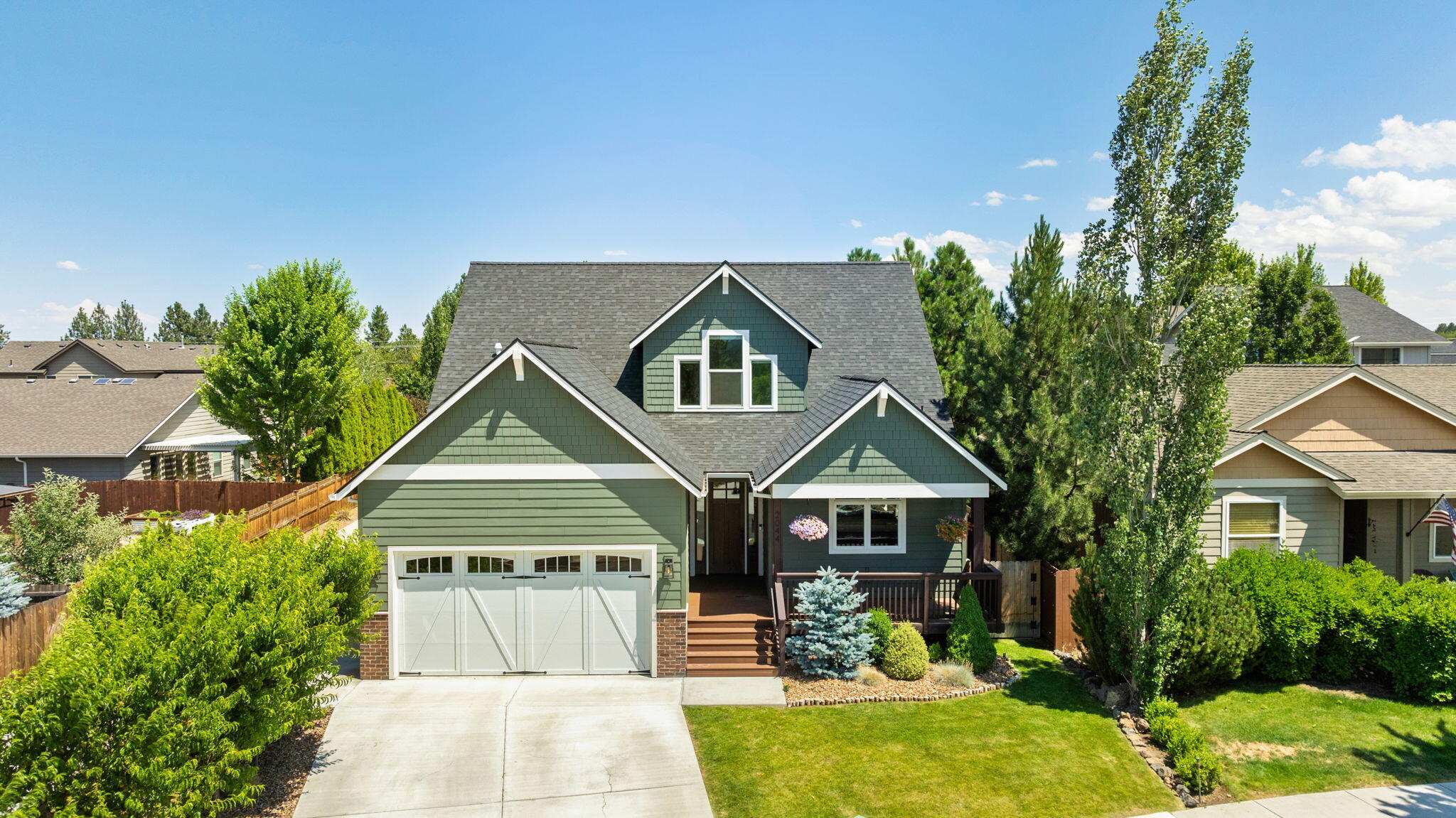 This custom Craftsman-style home is nestled in the highly desirable Eagle's Landing neighborhood, offering a perfect blend of comfort, functionality, and location. Move-in ready, this turnkey home showcases fantastic views of the Cascade Mountains and Pilot Butte. Inside, you will find high-end finishes throughout, including custom maple hardwood cabinetry, a huge vaulted great room with exposed beams, and a beautifully appointed kitchen with matching KitchenAid appliances. The property is just a block from Mountain View Park (basketball court, playground, trails, etc.) and close to excellent schools, making it a wonderful option for those seeking a connected and convenient lifestyle. You'll also enjoy easy access to nearby medical centers, shopping, dining, and outdoor recreation, all while being surrounded by established infrastructure and well-maintained homes in a welcoming neighborhood. This is a rare opportunity to enjoy Bend living in a location that truly has it all.
