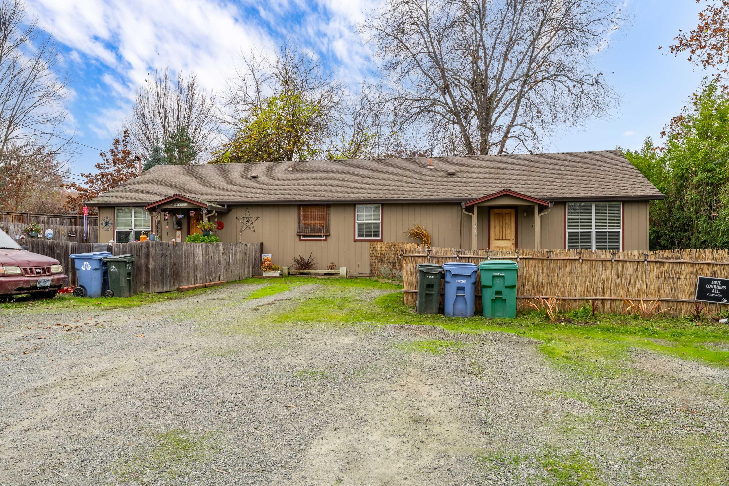 Income producing duplex on a large lot with room to possibly expand or build more units. Long term tenants in both units with strong payment history make this the ideal investment opportunity at a 7% CAP rate! Each unit offers approximately 847 SQ. Ft. with 2 bedrooms and 1 bath. The property includes two wells, one of which feeds both units. Connected to city sewer. There is a storage shed on the property for tenant storage. Located within 10 minutes of Downtown Grants Pass, Three Rivers Hospital, Grants Pass Golf Club, the Rogue River, and grocery/retail shopping. Contact your agent for further details. All information is deemed reliable, buyer to perform their due diligence.
