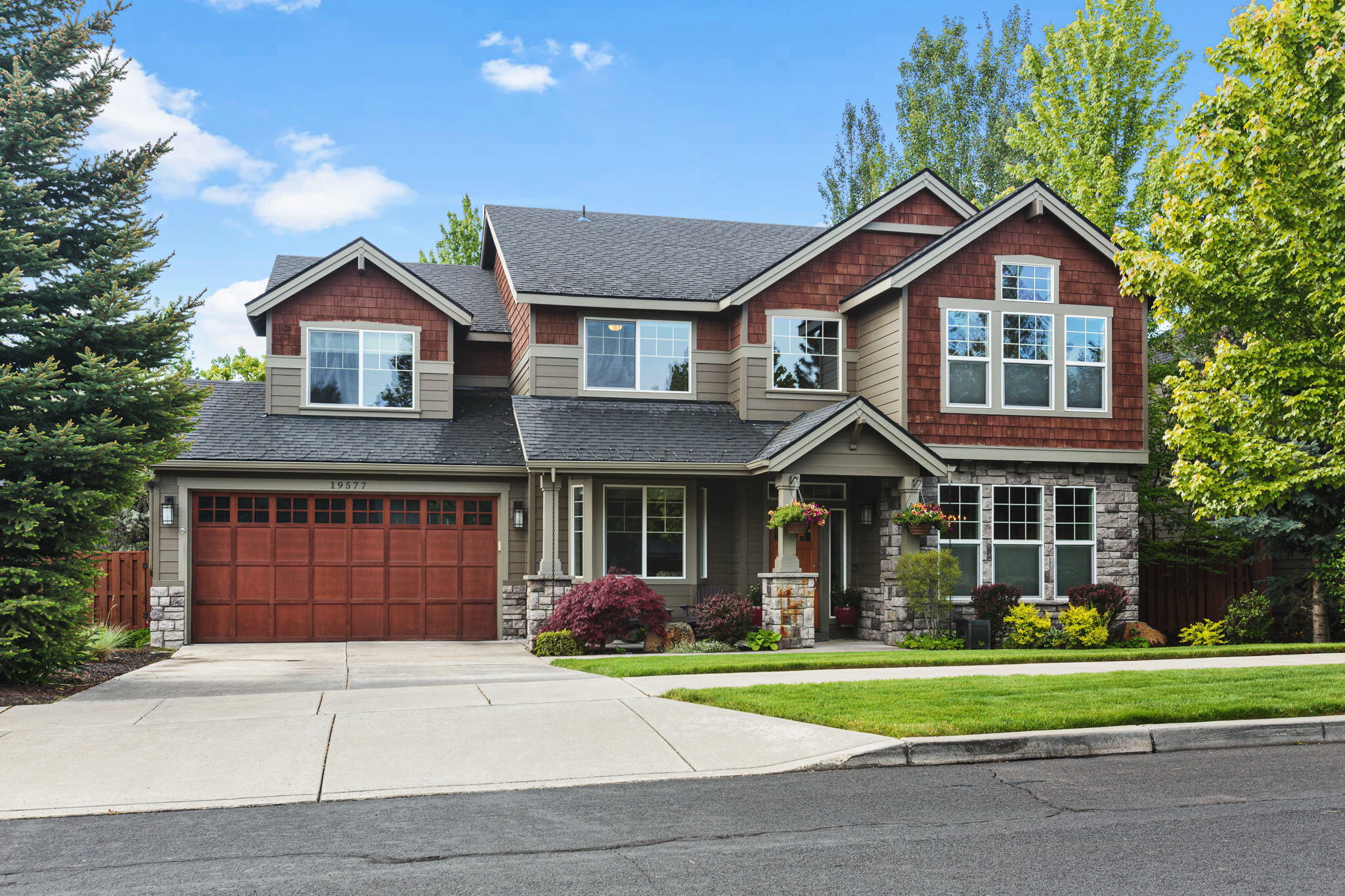 Beautiful curb appeal greets as you enter the grand foyer of this elegantly remodeled home to find soaring ceilings, inviting dining room on one side and office/den opposite. From the dining room you'll enter the huge walk-in butler pantry with prep sink, sprawling quartz counters, cabinet space, wine + beverage fridge, and built-in Miele coffee/espresso system. Continue into the kitchen featuring a huge island with quartz, stainless 6-burner cooktop, double ovens, and built-in baking center. The open layout flows to the family room with floor to ceiling tile surround fireplace. Gaze out the sliding glass door and windows to the serene backyard oasis featuring a stunning waterfall, pond, and lush landscaping. Entertain on a 1,000-sf paver patio with built-in gas firepit and hot tub. Massive primary suite and 3 more generous size bedrooms, laundry and theater style/multi-function room complete the 2nd story. Enjoy parks, river trails, pool, tennis court, clubhouse, and fitness center.