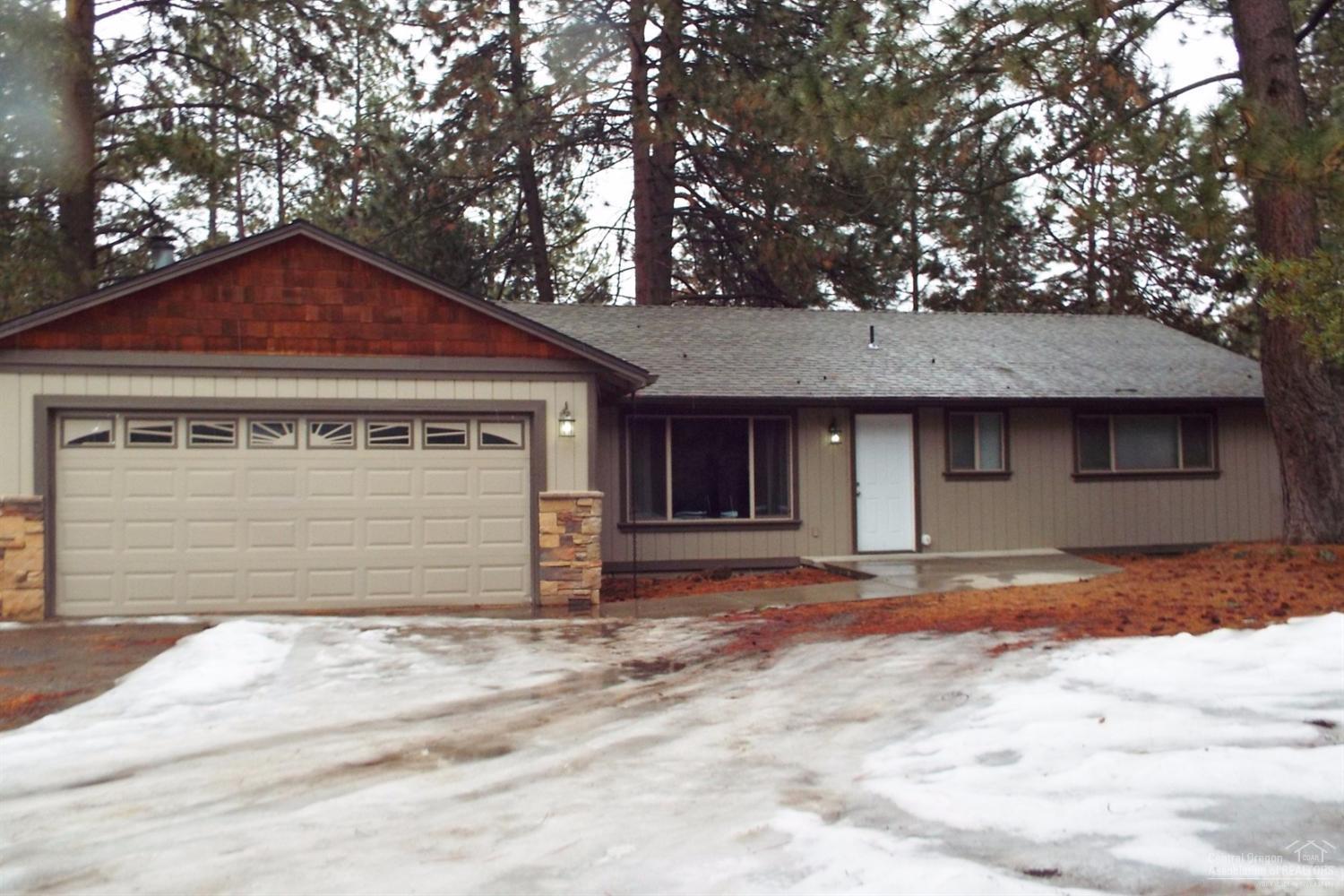 Completely remodeled 1440 sf ranch style home on .75 acre lot. This home has a living room and family room, two spacious bedrooms, two baths with tile showers and kitchen has stainless appliances. Features include hardwood floors and vaulted ceilings. The backyard is fenced with a stamped concrete patio. RV parking and room for a shop.