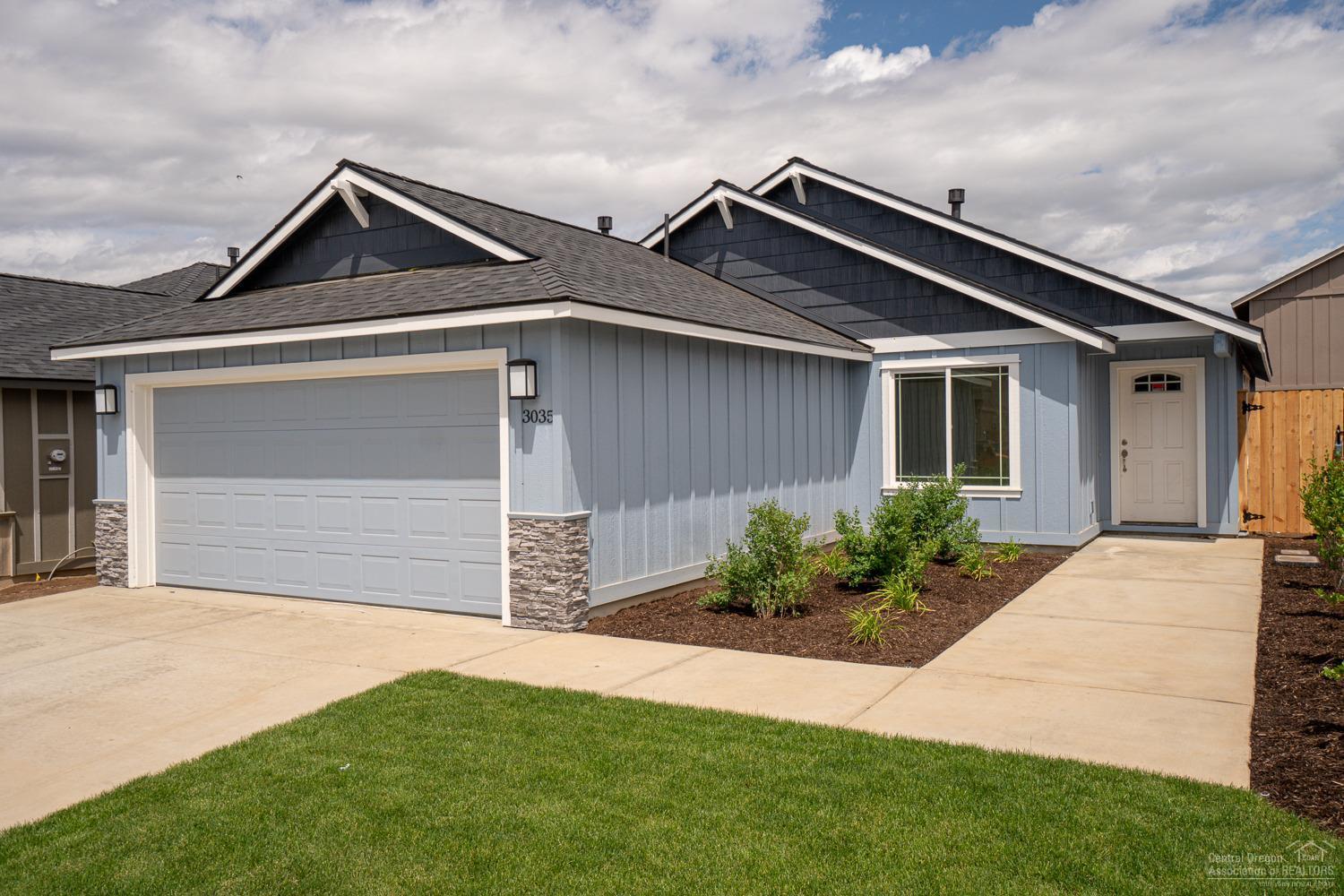 Brand new home in NW Redmond! This Martin floorplan offers 3 bedrooms, 2 baths, 1,464 sf w/tons of windows. Cascade Mtn views from the front of the home. Lg great room plan, open to dining w/eating bar, Quartz counters in kitchen, SS Energy Star appliances, pantry. Spacious bedrooms, large master closet, dbl sinks in baths. Laminate flooring in main living areas. Forced air w/high eff. furnace, AC included. Dbl garage w/covered front entry & back patio. Front landscaping w/sprinklers, fenced yard. These photos are of a Martin Floorplan with a different interior color package. Call an agent today to visit our current model at 3025 NW Cedar Ave. Open 12-5pm Thurs-Mon.