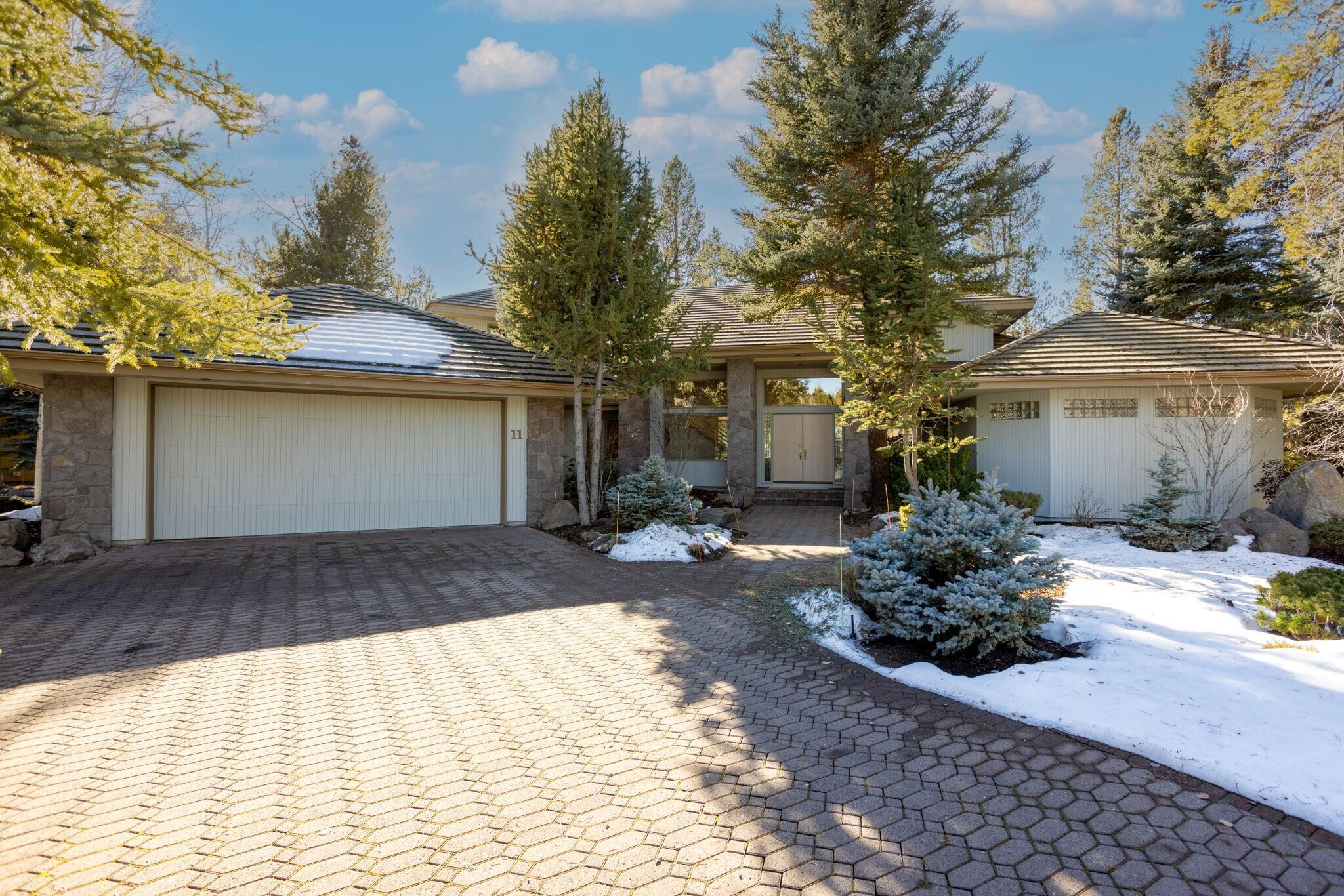 Stunning home in highly sought-after North Course Estates in Sunriver.  This property offers the best of both worlds - a private oasis within a gated community and the convenience of being close to Sunriver amenities. Situated on a spacious 0.38 acre lot, this residence offers beautiful views of the pond and golf course. The home features 3 bedrooms, 3.5 bathrooms, office, and boasts 3,574 square feet of living space with large windows, Oak wood accents, and an open airy feel.  Primary bedroom is on the main floor, adding an extra layer of comfort and accessibility to this already impressive home. The 3-car garage is expansive with plenty of space for your vehicles, storage needs, and hobbies. Don't miss the opportunity to make this exquisite home your own!