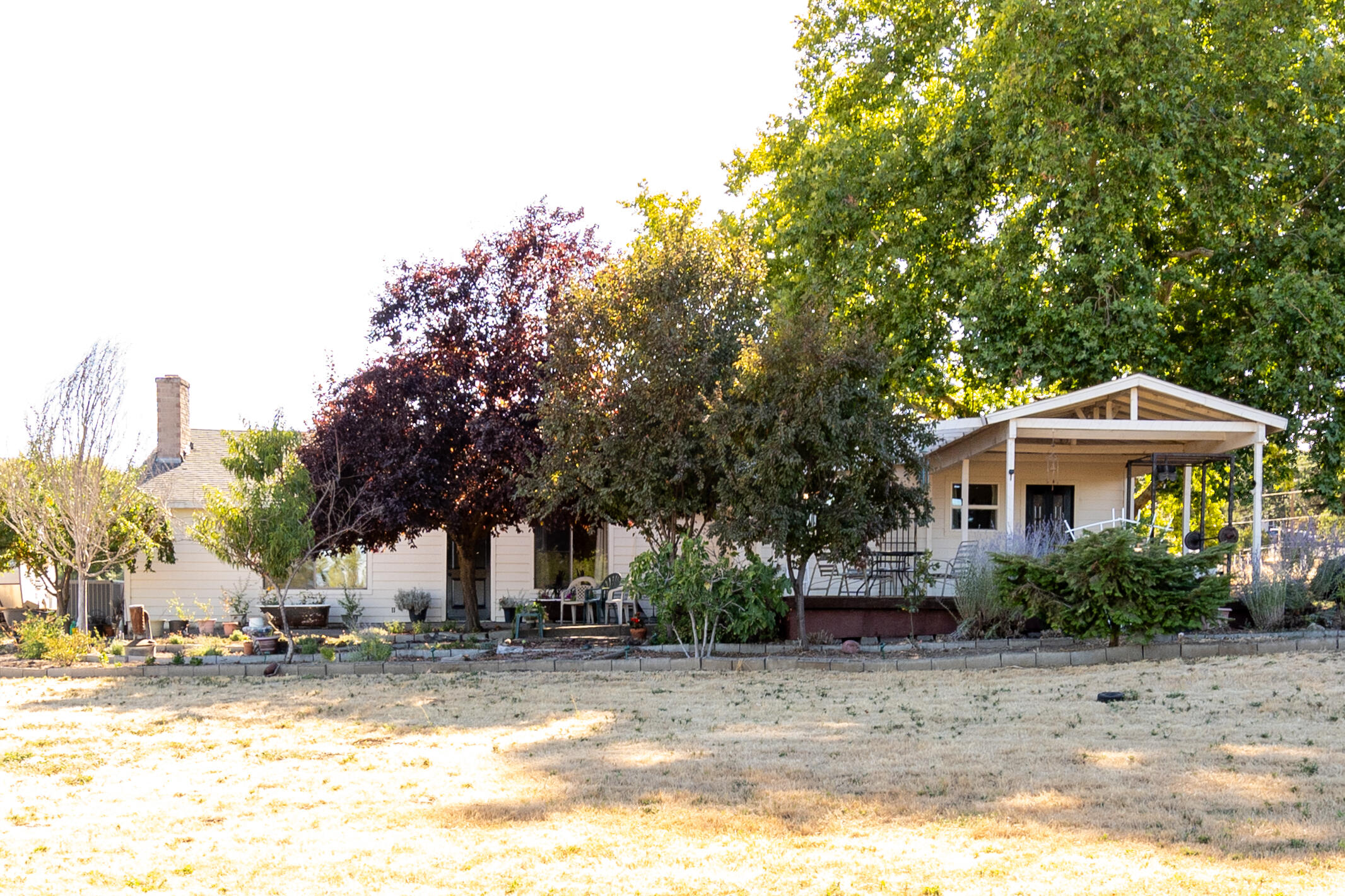 This Charming One-Story home with Mountain Views & Room to Grow
on 2.06 acres with stunning mountain views! This 3-bed, 2-bath home offers 2,146 sq ft of well-designed living space, including a large craft room—ideal as a 4th bedroom, office, or could easily be converted into an In-laws suite. Enjoy the open-concept family room with a cozy wood-burning fireplace, and a spacious country kitchen that flows into a bright dining area. Step outside to a private oasis with mature fruit trees, garden space, irrigation pond, and a covered deck perfect for relaxing or entertaining. Just minutes from downtown Central Point, this property combines peaceful country living with city convenience. A rare find—don't miss your chance! 
 Sellers are motivated and willing to help with closing costs.  Call for a viewing appt.