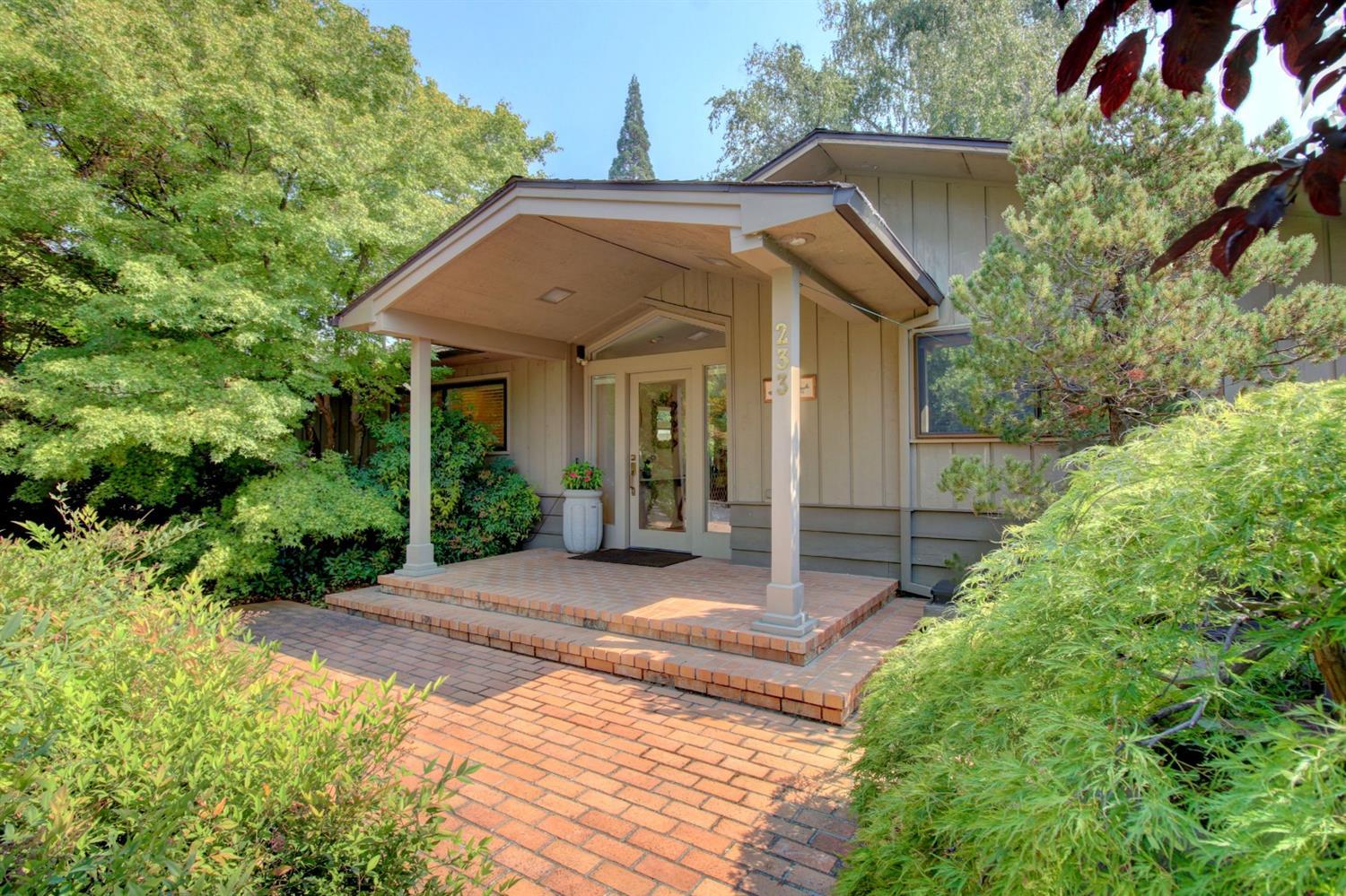 Mid-century modern classic. First time on the market in 60 years! A unique opportunity to own this singe level one owner home on one of the nicest streets in Old East Medford. Elegance is abundant in this home with its open floor plan and it is perfect for entertaining. After dinner in the formal dining room relax into the cool living room. Large walls of windows flood the home with light and hardwood floors warm the space. The kitchen opens to the family room for tv watching. The modern master suite wing is spacious with double vanities, make-up area, marble shower int he bath, a huge walk-in closet and walls of windows. Set on a park-like 1/2 acre with large trees and hedges giving you plenty of shade and privacy, you'll never guess you are living in town. Entertain outside on the spacious deck and patio. 25x12 shop in the garage, huge RV parking, circular driveway and amazing curb appeal make this a dream home.