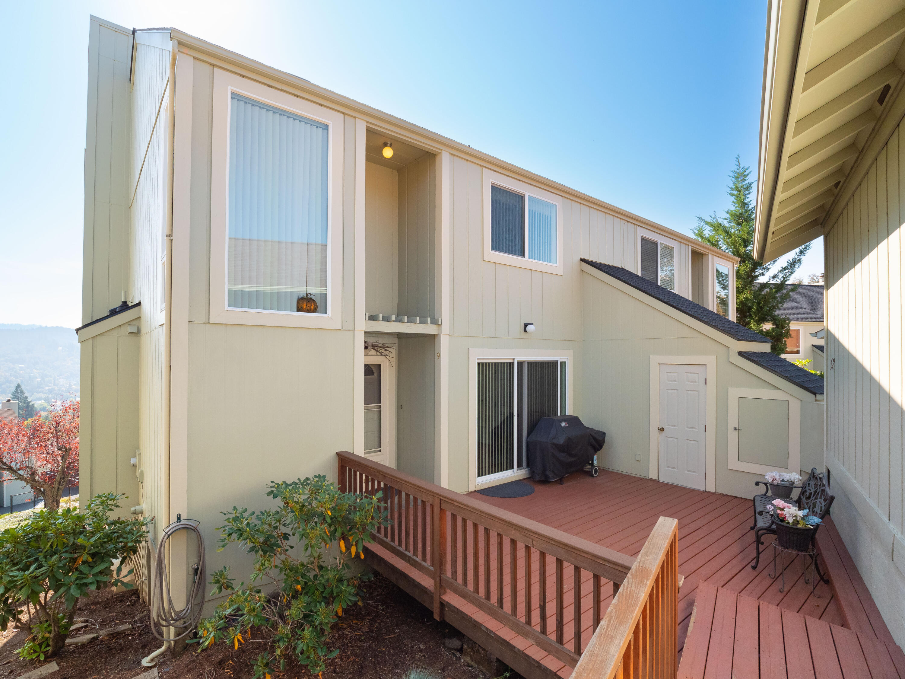 Enjoy peace, quiet and carefree living in this well maintained and move-in ready condo. Fantastic panoramic views of the city, mountains, sunrises and sunsets from the open living and dining areas with floor to ceiling windows and large covered deck. Spacious bedrooms, newer kitchen appliances and gas forced air heat and air conditioning, detached 2-car garage and pool. Welcome Home!