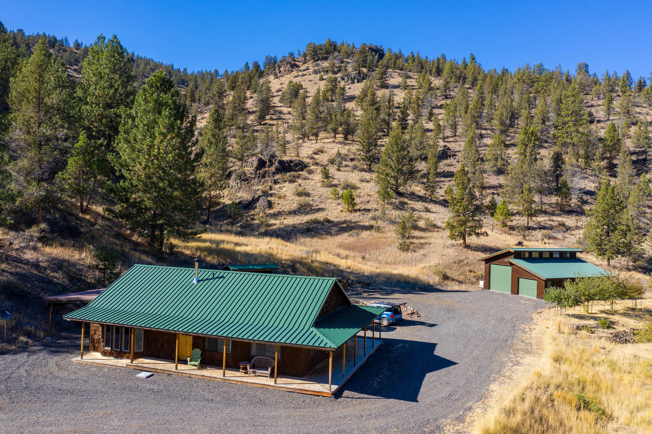 Quarantine Cabin Property for a King/Queen!  If you love privacy, hunting, wildlife, recreation, Look no further than this 160 acre year around retreat for you, and  friends, and family. Totally self sufficient w/ state-of-the-art solar energy with automatic generator back up, it is set up for any season, any time. Big newer shop with wood heat for all your toys and to create any project you can imagine. Wickiup Creek runs through the property (seasonally). LOP tag available. Especially during these uncertain times, secure this standout, off-grid cabinet property while it is still available. Please review attached photos and video.