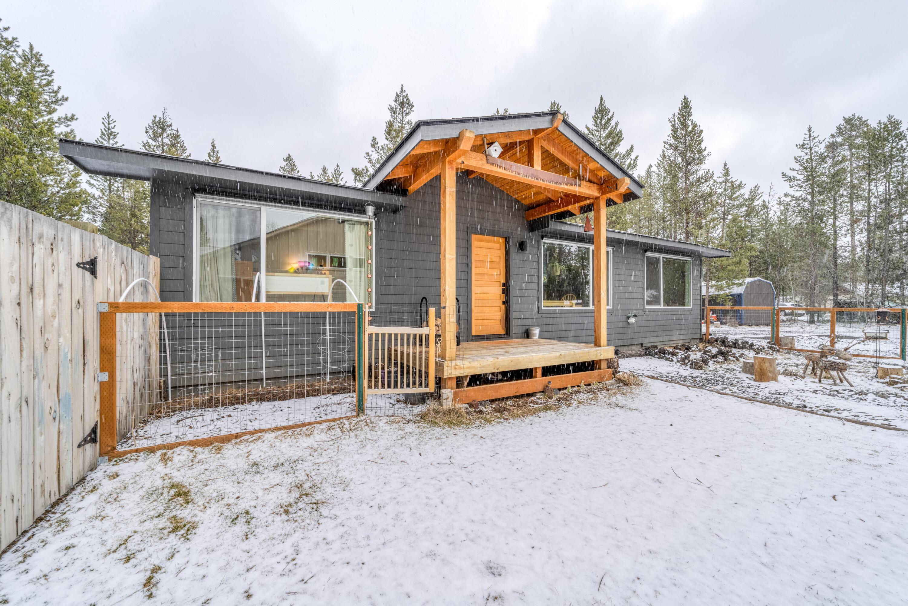 Fall in love with this charming, recently renovated home on a large lot in a quiet neighborhood. Oregon Water Wonderland is a desirable community with a private boat launch and borders nearly 40 acres of Deschutes National Forest and the Deschutes River. Just minutes from Sunriver with easy access to Bend and all that Central Oregon has to offer. The home has been updated from top to bottom. A few of the many improvements made in 2019 include but are not limited to a new roof, window, trim and doors, new flooring, soft close cabinets, quartz countertops, woodstove and so much more. Contact your real estate agent for a full list. The large .5 acre lot with mature trees, garden area and fire put is fully fenced and ready for your imagination. Come make this wonderful house your home.