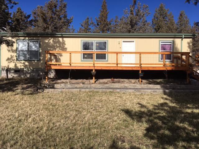 Large double lot with 2019 manufactured home. Lite and bright inside featuring vinyl flooring and knotty alder cabinets throughout. Two guest bedrooms with walk-in closets. Master bedroom with double vanity, tub/shower combo. Fully fenced yard with RV parking, garden area, and terraced landscaping. Ochoco West neighborhood amenities include pool, private lake, hiking, ATV riding, shooting range, main hall, horse stables and RV storage.