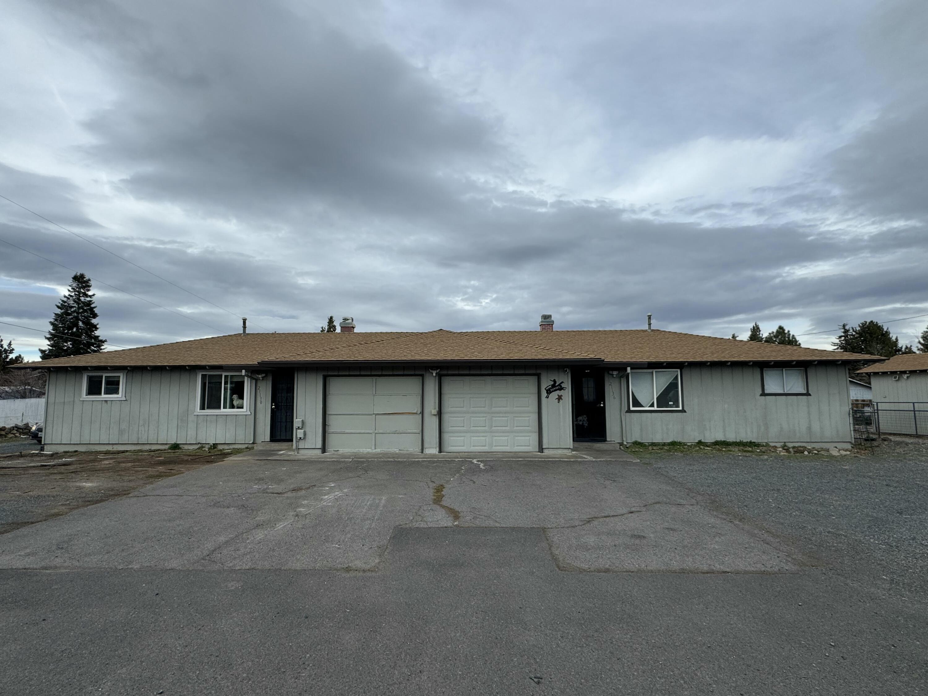 Investor's dream! This duplex sits on just over half an acre, offering huge potential with the city's new density codes. Each unit features 2 bedrooms, 1 bathroom, and a private garage, making it ideal for rental income or multi-generational living. While the property needs some work, it provides a fantastic opportunity to add value and maximize returns. With plenty of space for expansion or redevelopment, the possibilities are endless. Don't miss this chance to capitalize on a rapidly growing area!
