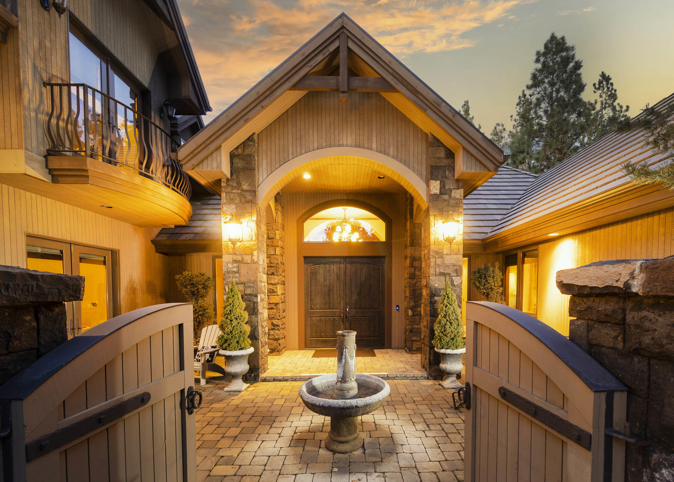 Single level living Broken Top home offers impressive balance between NW Mountain Home & European Villa architecture.  Gated front courtyard is the welcoming heart of the home, seamlessly connecting the comfortable interior living spaces w/ outdoor terraces.  Nestled on ½ acre w/golf course views & abundant privacy. Interiors are characterized by clean lines, flowing floor plan & superb finishes. Grand entrance opens to golf course views from spacious living room, dining, sitting room & kitchen, w/ Viking cooktop, double ovens, warming drawer, prep island & brkfst bar.  Entertain at full bar, loft & media room, that can function as an addtl guest suite.  Owner's suite features fireplace, private terrace & palatial bath.  Two  full-ensuite guest-rooms w/ built-in desks & an Office w/ fireplace, desk & private courtyard entrance.  Covered patio features golf course views, firepit terrace & outdoor kitchen. Premier gated golf course living minutes to Bend, Mt Bachelor & Deschutes River