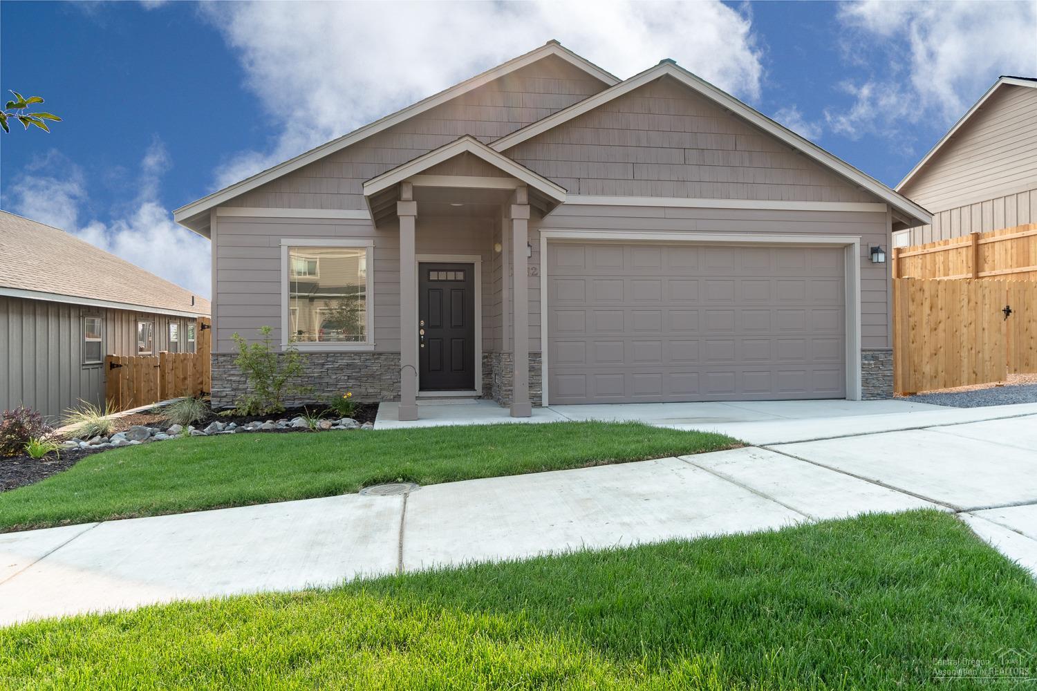 Brand new, ready to move in! 3 bedroom, 2 bath, 1,662 sf of open living space & hard to find RV parking. Great room layout w/vaulted ceiling & cozy gas fireplace. Shaker style cabinets, Quartz slab counters & SS Energy Star appliances in the spacious Kitchen. Gas forced air w/high efficiency furnace & A/C included! Dbl garage w/opener. Step off the deck into a fully landscaped & fenced back yard. Enjoy fantastic views to the east & north to Smith Rock. Lg lots w/ room to enjoy the summer outdoors!