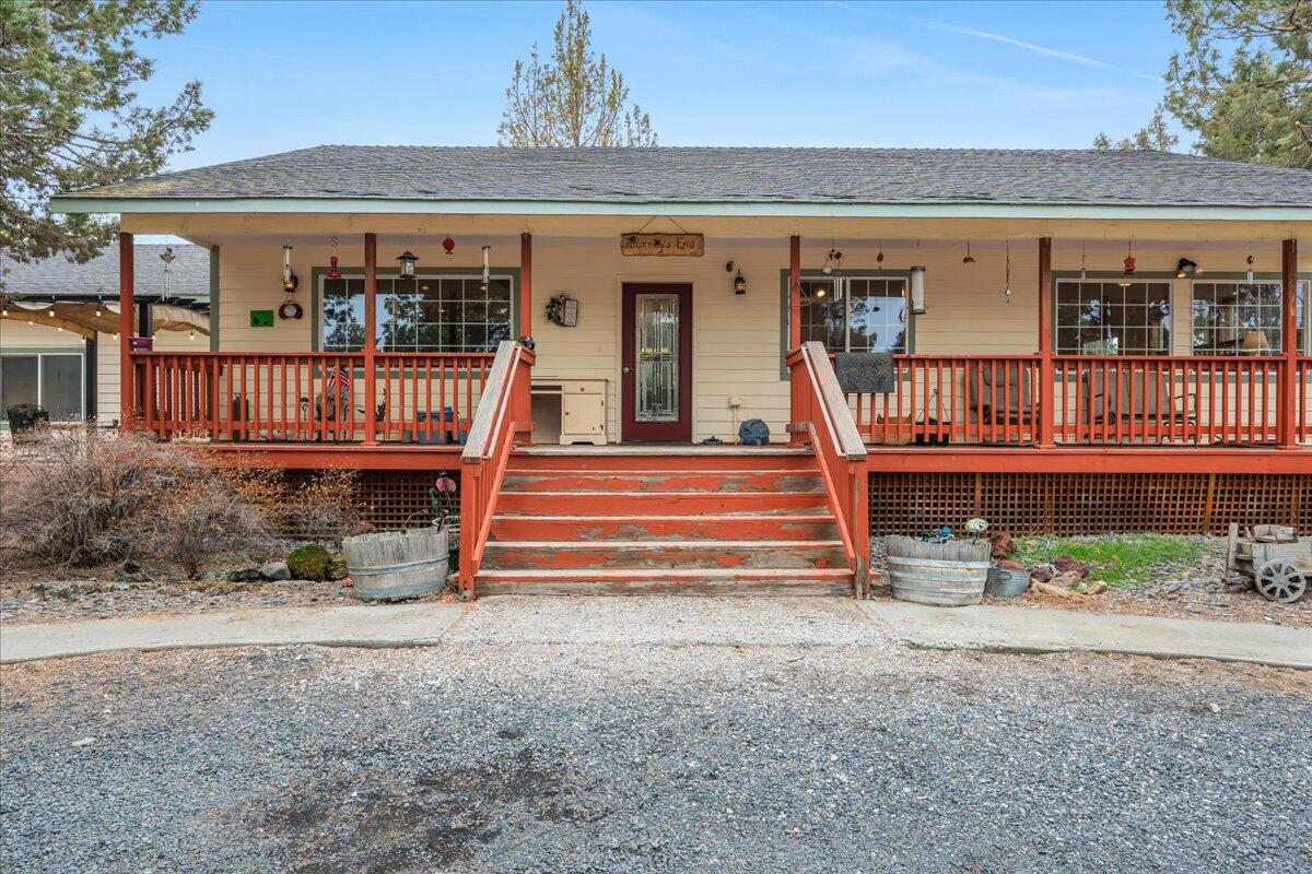 Looking for a hidden Country Home that's  close to Redmond but just off the well traveled path? Mayab just outside the City limits but only 10 minutes from the Redmond City Center? Perhaps a location at the end of a short road adjacent to the new Wetlands Project? This is a Must See!
Officially a 2 bedrooms with funcional 3rd office/bedroom. Big modern Kitchen with plenty of windows to view the constant everchanging nature scenes. Open living room, comfortable size bedrooms and Huge primarty bedroom. There's Wrap round decks, real hardwood floors, 2 Garages, an enormous pond, a recently remodeled 1,152 sq. ft. ft. fully insulated garage/shop/storage building, a recent well depth extension and pump replacement; fully enclosed 24' x 32 x 12H  aviary or henhouse with a separate enclosed structire., a fully fenced garden area, numerous frost free faucets,. 2.5 hard plumbed irrigated acres, and a great deal more. This may be the country home you are searching for.