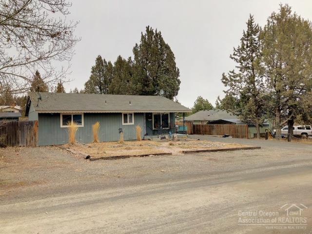 Charming 2 bedroom, 1 bath 1170SF open floor plan on .20 acres. Home is nicely updated, fenced back yard, landscaped, Back deck is full length of house. Room for RV and to add the garage of your dreams! Community amenities including stables(by availability w/ fee), outdoor pool, fishing pond, trails, clubhouse/rec room, & community lands for recreational activities.