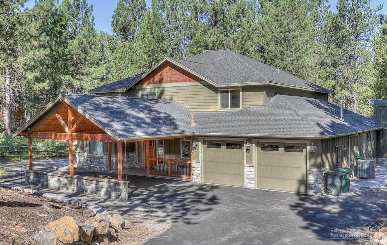Riverfront Home on 1.25 acres, just outside Sunriver! Perfect vacation or family home, with extensive rental history. This gorgeous home boasts 7 bedrooms, 7.5 baths (sleeps 18!) with a bonus room in the main house. There is an additional 3 bedroom, 1 bath guest house above the detached heated 30'x48' shop! Main residence has craftsman covered entry, stone fascia, hand troweled walls, huge great room with a massive stone gas fireplace, great river views, chef's kitchen with a gas Wolf range/oven, 2 Sub-Zero ref/freezer, walk-in pantry, coffee nook with river views, huge back Trex-deck with patio, hot tub, lawn & stone fire-pit leading to river dock! Your riverfront property/ski chateau awaits!<br>