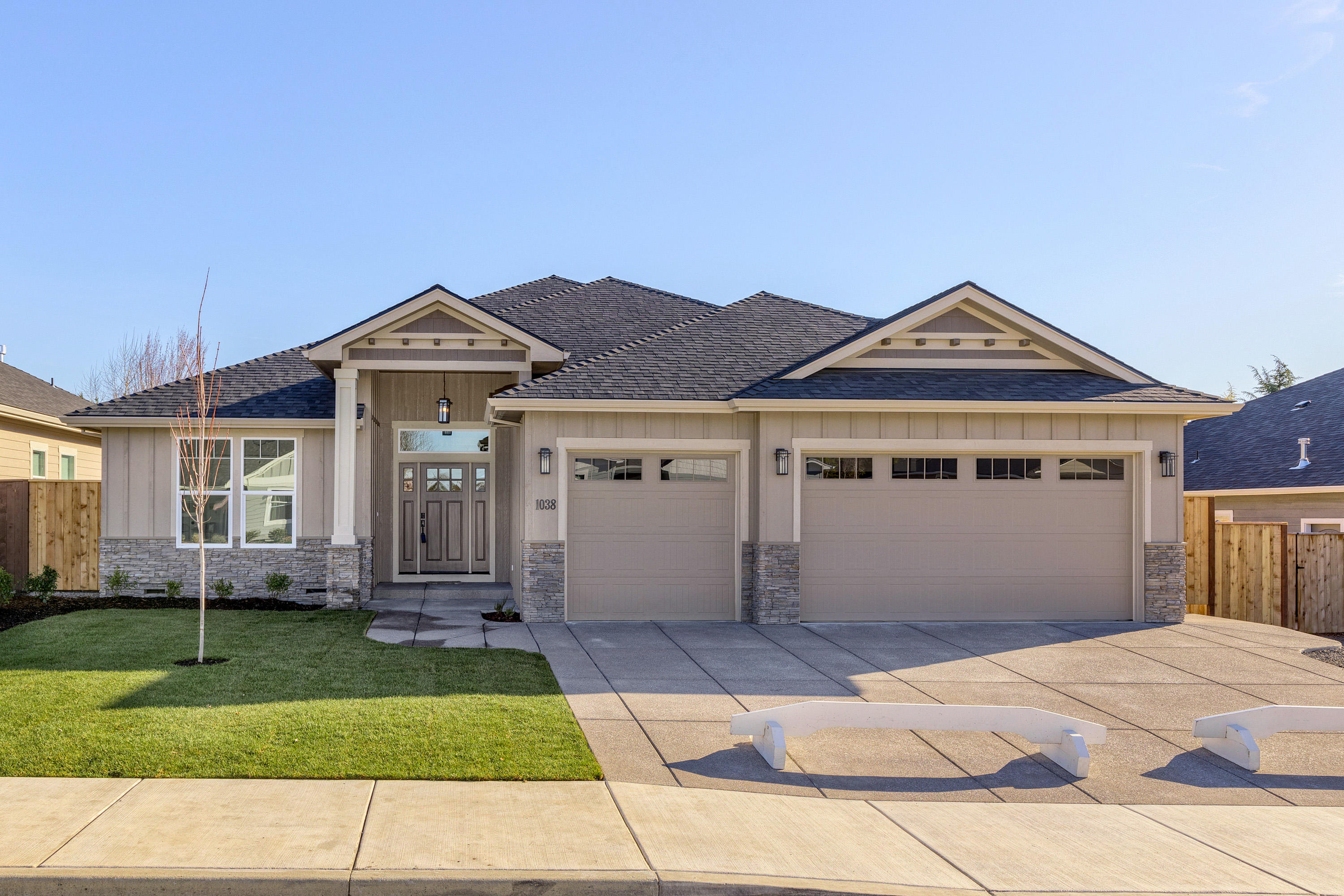 Another Beautiful new custom home by Preferred Homes in the Eagle Point Golf Community. 2527 square feet of luxurious living space in this amazing new home. The floor plan features a great room design with a spacious peninsula style kitchen that includes upgraded package with gas cooktop and double wall ovens. 10' ceilings throughout with a double coffer ceiling in the main living area all working to provide an amazing and inviting living space. The master suite features a custom tile dual head shower plus a large tile surround tub. Loaded with features and upgrades including custom cabinets and trim package, gas fireplace, beautiful wood or laminate and tile flooring and so much more! Energy Trust Certified with smart home upgrades. The home is situated on a level .31 acre lot with additional rear access for potential RV parking.
