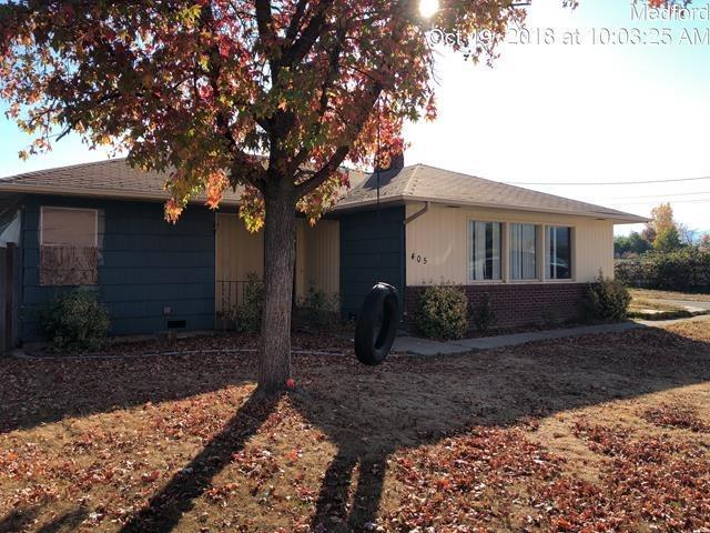 Country property close to town! A little bit of TLC and this property will be perfect! 4 bedroom home with 3 full bathrooms. One bedroom and bathroom was added on to home and would be a great two family/ in-law situation with it's own separate entrance. Hardwood flooring, 2 car garage, large covered RV area, inground swimming pool, exterior sheds and on .93 acres. Not many big lots so close to town are left!! Currently zoned EFU.