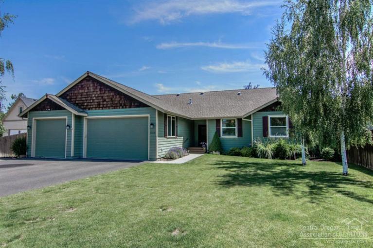 One level custom built 3 bed plus den 2 bathrooms 2505 sq ft home w/triple car garage on over a quarter acre beautifully landscaped & fenced lot. Home has very high end features No vinyl in this home, granite, stone and slate Two heating systems for efficiency results in very low energy costs. Central Vac, hot water on demand. Large covered deck for entertaining This neighborhood is very special with custom built homes on larger lots and only 5 minutes to Bend Golf and Country Club Extensive storage space