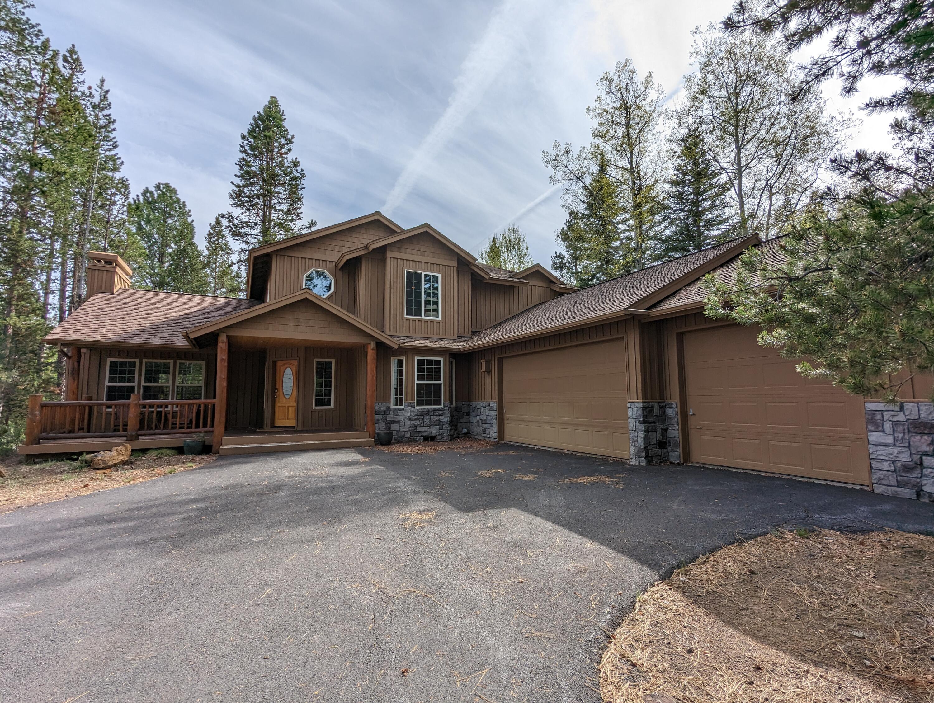 Welcome to 5 Oregon Loop, where luxury & convenience meet! This stunning two-story NW style home boasts 5 bedrooms and 3.5 baths, featuring two primary suites, one on each level. The spacious layout offers flexibility and privacy for the investment buyer or for family and friends. The main level showcases a gourmet kitchen, perfect for culinary adventures, while the upper-level primary suite offers a peaceful retreat with a private bathroom. The remaining well-appointed bedrooms provide comfort & space. Immerse yourself in the beauty of the surrounding nature from the inviting outdoor living spaces at the front and the back of the home. Enjoy the convenience of a fully furnished home, where every detail has been taken care of. Relax & unwind in your private hot tub, creating the perfect sanctuary for relaxation. Sunriver offers an array of amenities, including golf, swimming pools, tennis courts, and miles of biking & walking trails. Don't miss the opportunity to make it yours!