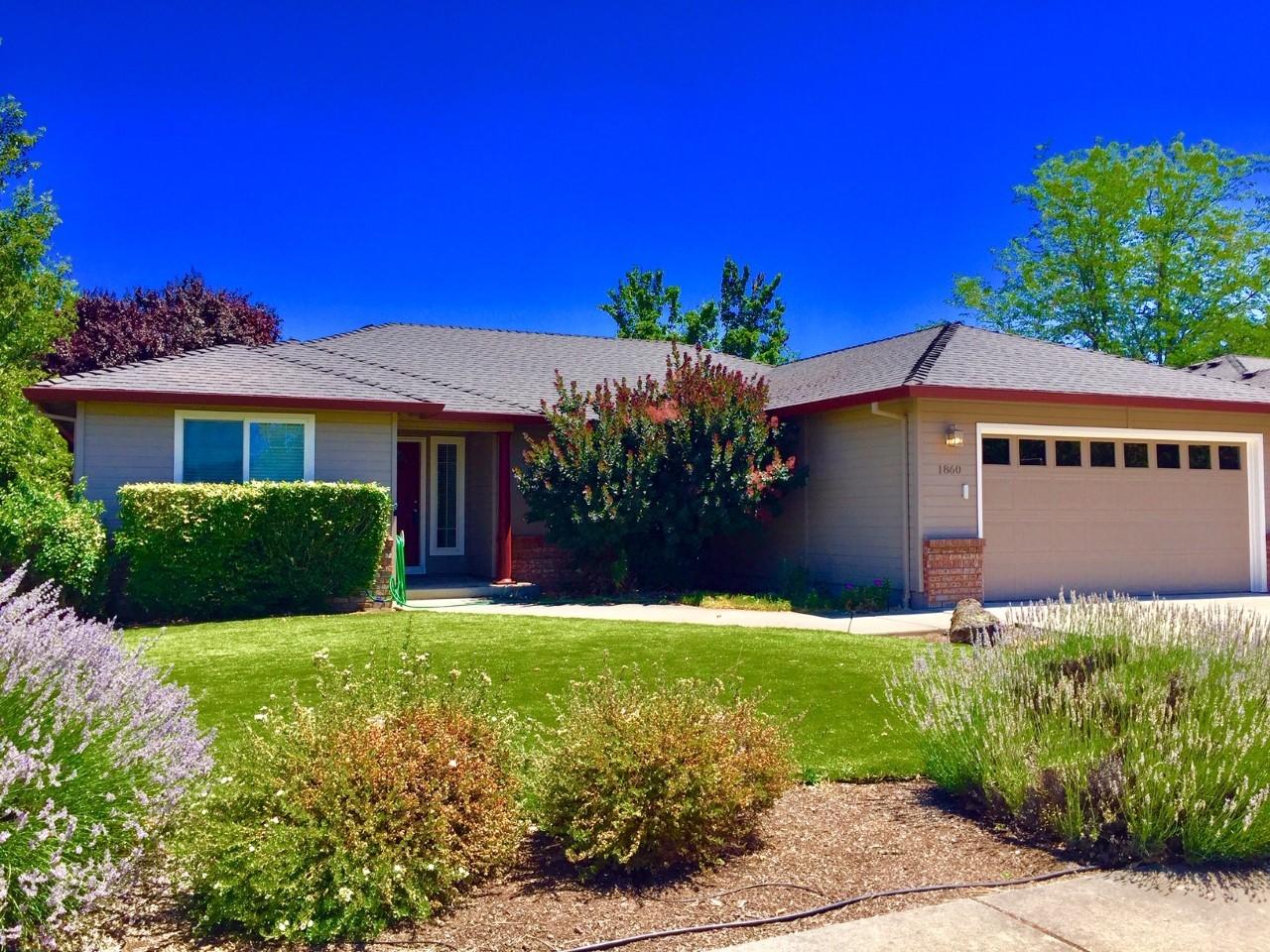 Great single level home on corner lot in highly desirable neighborhood, ready for your personal touch!  Great room floorplan with open kitchen and breakfast area; semi-formal dining area; popular split bedroom plan with private primary suite.  Walk in closet in master bedroom; coffered ceiling in living room.  Covered patio area with tidy, easy care turf landscaping; irrigation system on timer.  Great fenced yard with possible room for small rv or boat parking.  New exterior paint and some new fencing; wood laminate floors about 3 years ago.  Great curb appeal, and Priced to sell!