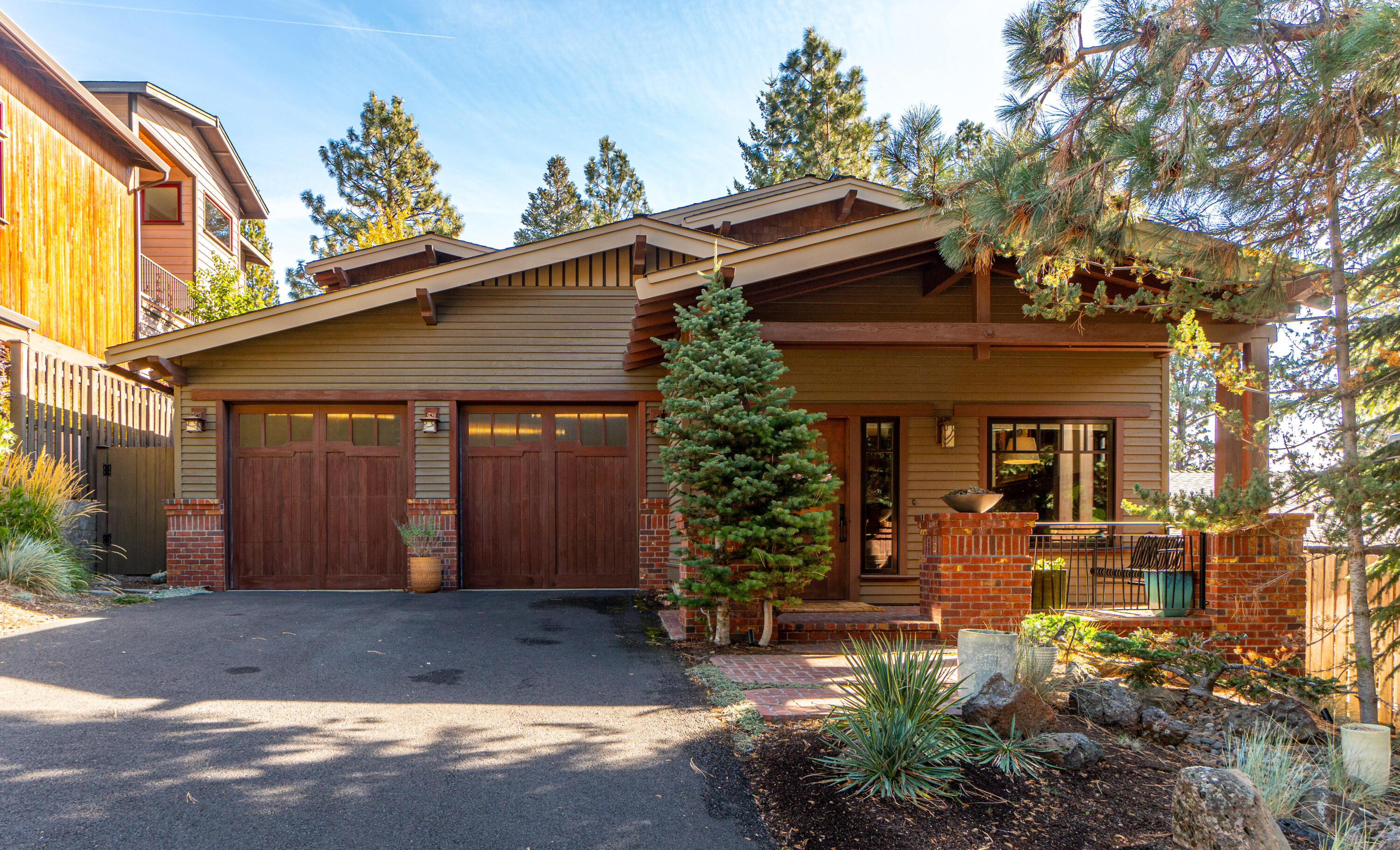 Charming contemporary craftsman-style home built in 2007 with 3 bedrooms, 3 bathrooms and 1950 sqft of living space. This home boasts hickory hardwood floors, high ceilings, a wood-burning fireplace, and double-hung wood windows. The gourmet kitchen features Viking appliances and a wine cellar adds a touch of luxury. The property also features a 5.5 kw LG solar array, tankless water heater, Trane Clean Effects hvac filter, and cozy wool carpet. This home has it all - comfort, style and sustainability!