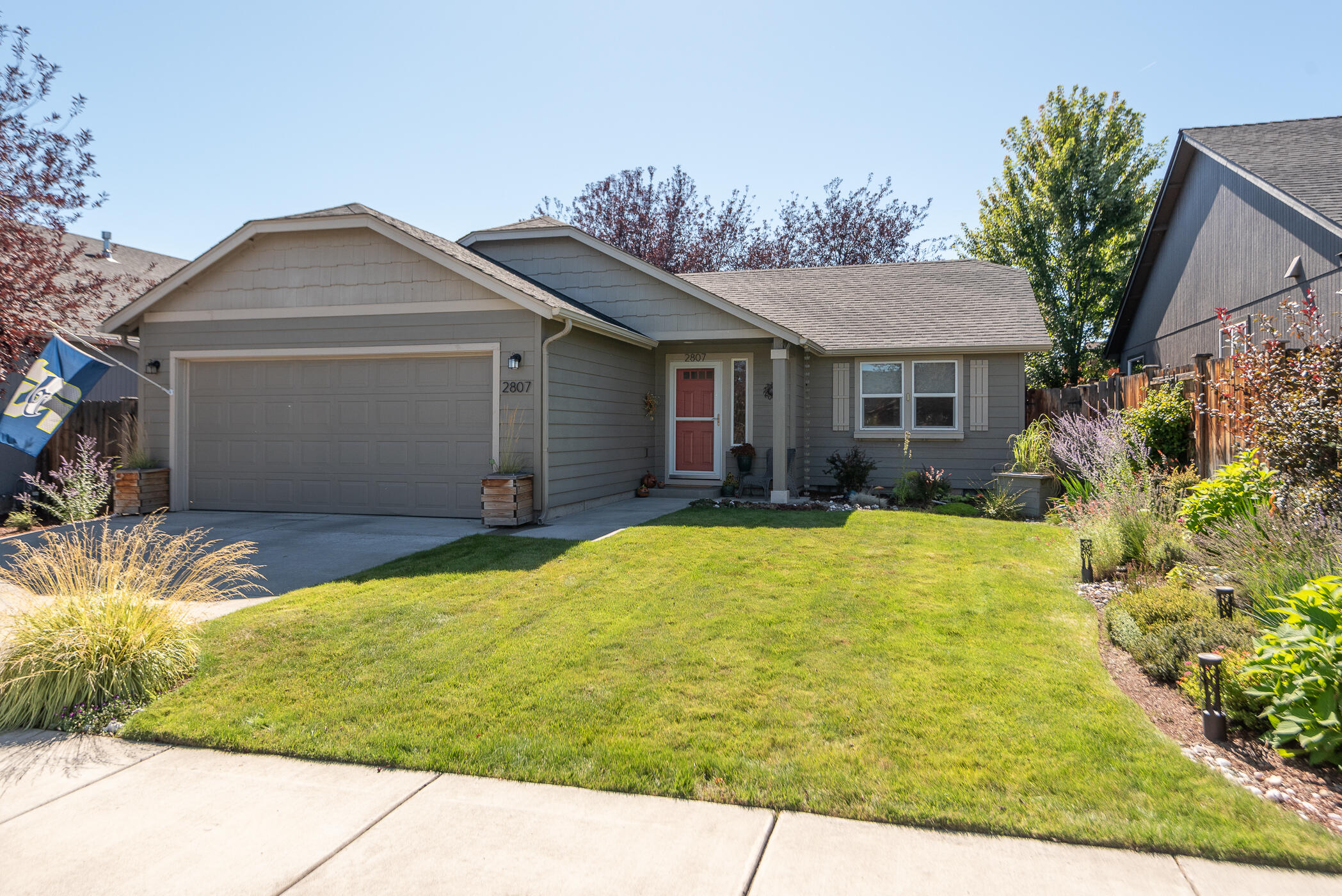This a delightful 1,148 sf single level home with 3 bedrooms, 2 bathrooms and an open great-room concept in NE Bend. Features include vaulted ceilings, tons of natural light, new carpet, updated solid surface counters, new stainless steel appliances, air conditioning, newer exterior paint, and a two car garage. The low maintenance back yard is as cute as a button. Everything has been impeccably maintained by one owner and this house is move-in ready. Situated on a quiet street, close to schools, shopping, tons of dining options and medical facilities. Don't miss this one!