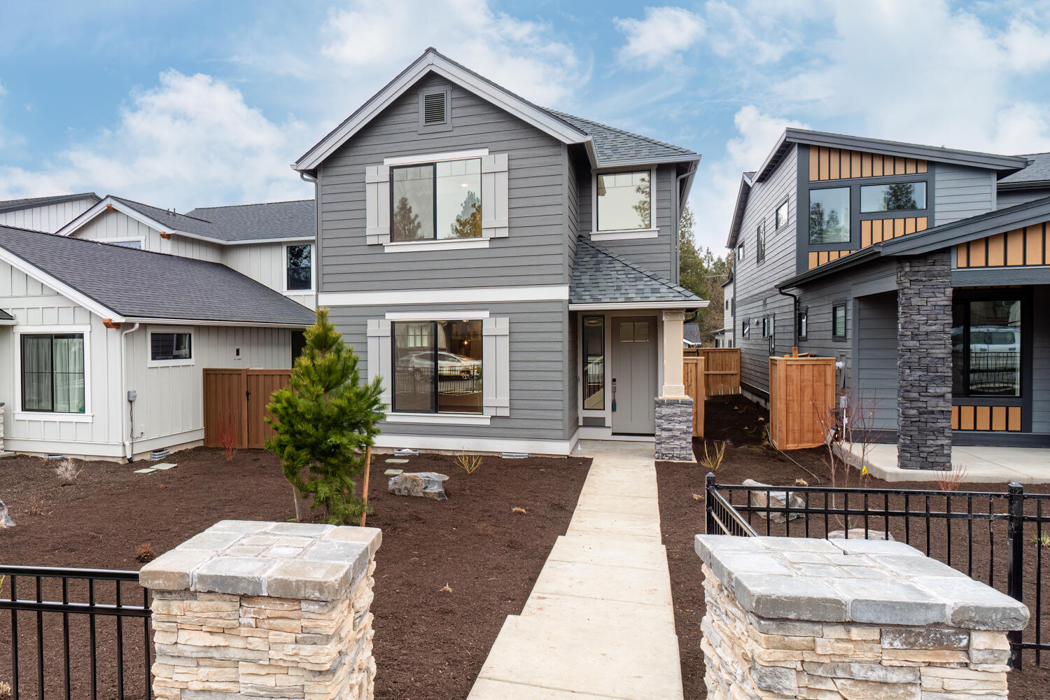 Lot #14 - Introducing the Conifer plan at Skyline West by an award winning builder. This beautiful home has all the luxury features you expect from this builder. Upstairs enjoy a spacious loft, secondary bedrooms and a beautiful primary suite complete with sitting area and oversized closet. Homes in this community are crafted with integrity and quality and include high-end features like nine-foot ceilings on the main level, custom built-in cabinetry, engineered wood flooring in entry, great room and kitchen/dining room, quartz island and countertops with full height kitchen tile backsplash, Kitchen Aid Stainless-steel appliance package with gas range, walk-in shower with tile floor and tile surround (primary bedroom only), and smart home integrations. **Buyer to receive a $5,000 Buyer Bonus for using builder's Preferred Lender! *See site agent for details**