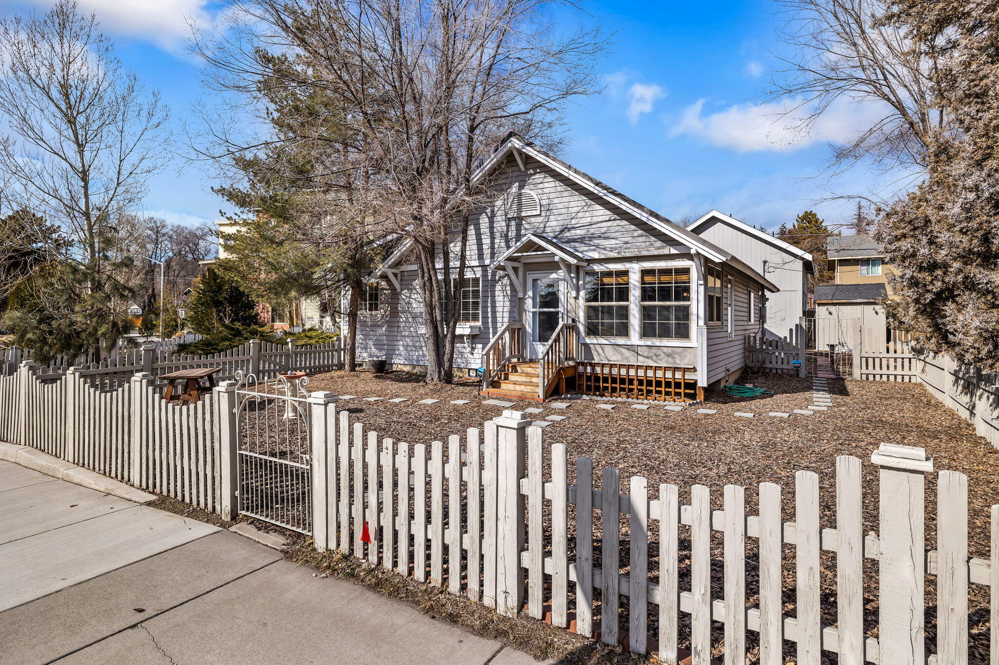 Looking for a perfect investment opportunity in the highly sought-after NW area of Bend? Look no further than this stunning property that boasts a single-family residence and a duplex. Whether you're an investor or looking to live in one unit and rent out the other, this versatile property offers a range of possibilities. The single-level residence features 2 bedrooms, 2 full baths, and plenty of character with original details and modern updates. The duplex has a 1-bed, 1-bath unit on the top level and a 1-bed, 1-bath on the bottom, offering ample space and privacy for tenants. Sitting on .20 acre, this property provides plenty of parking. Enjoy quick access to local hotspots like Newport Market, parks, river and downtown Bend, where you can indulge in the best restaurants, shops, and outdoor activities. Don't miss out on this incredible opportunity to invest in Bend's thriving rental market, with the option to live in a westside home and earn additional income from the duplex.