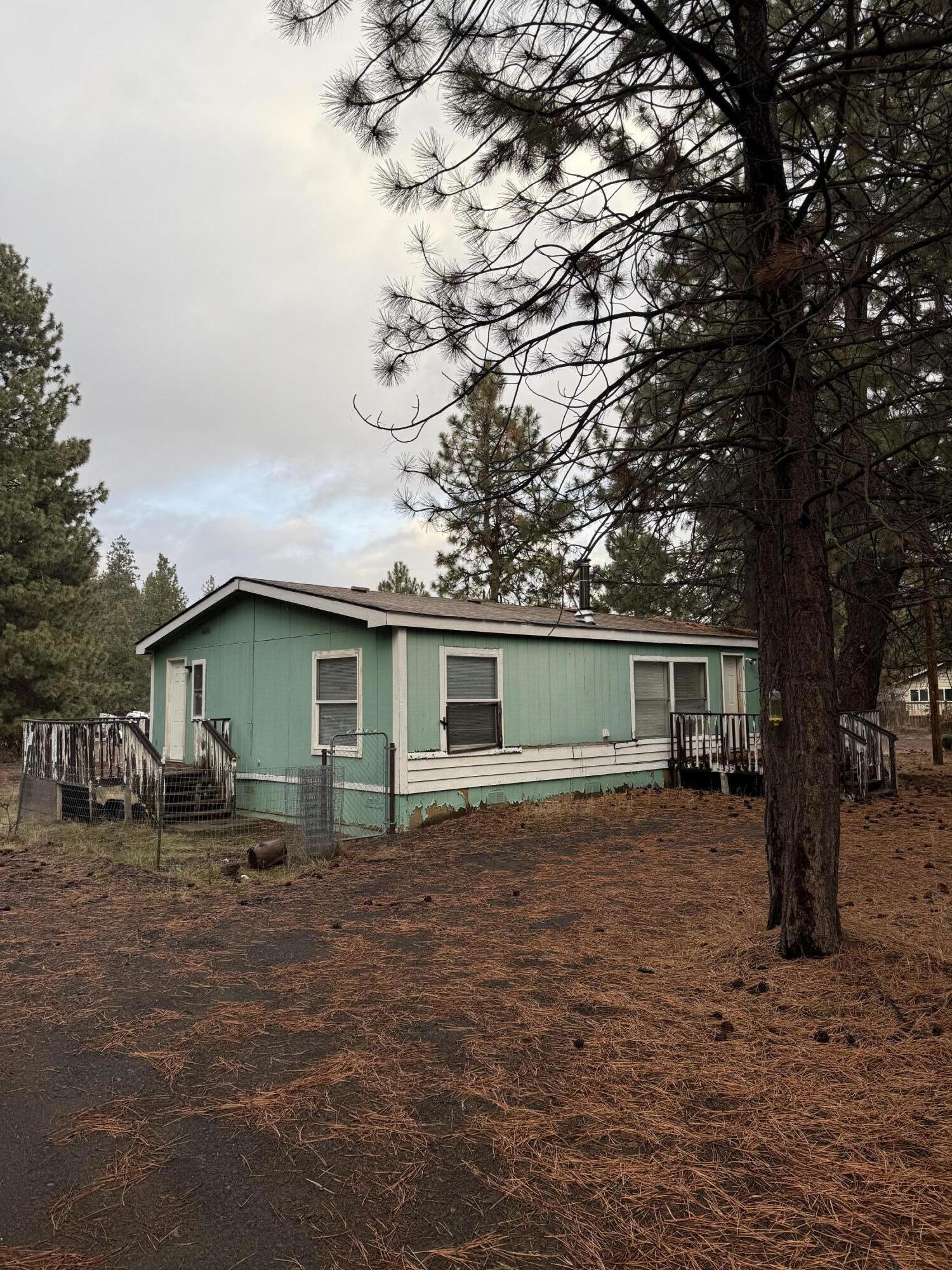 Looking for peace in the pines? This single-level home is located in Deschutes River Woods with convenient access to Bend, Mt. Bachelor, and nearby mountain lakes. Outdoor recreation including hiking, camping, and exploring is just outside your door. The home features 3 bedrooms and 2 bathrooms and was built in 1991. Solid bones with opportunity for updates and personalization!