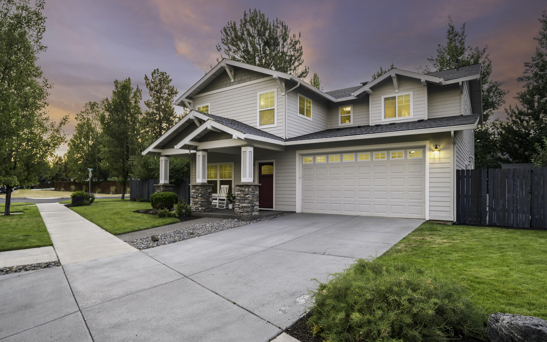Come experience all that Bend has to offer from this immaculate home in the established Stonehaven neighborhood in SE Bend with picturesque tree lined streets. The spacious corner lot offers a park-like setting with unmatched outdoor living complete with outdoor kitchen, built-in gas fire pit, putting green, multiple seating and eating areas for sun or shade, expansive paver patio, fruit trees, raised garden beds, sandbox, storage shed and wonderful privacy. The home features box beam ceilings, beautiful hardwoods, chef's kitchen with butler's pantry, open great room with cozy gas fireplace accented by built-in surround, formal dining or second living area, impressive primary suite complete with fireplace, dual walk-in closets and soaking tub and a generous 4th bedroom or bonus room. Nestled in a desirable community conveniently located with easy access to schools, shopping, Alpenglow Park and endless recreation opportunities. A perfect basecamp for the best of Bend living!