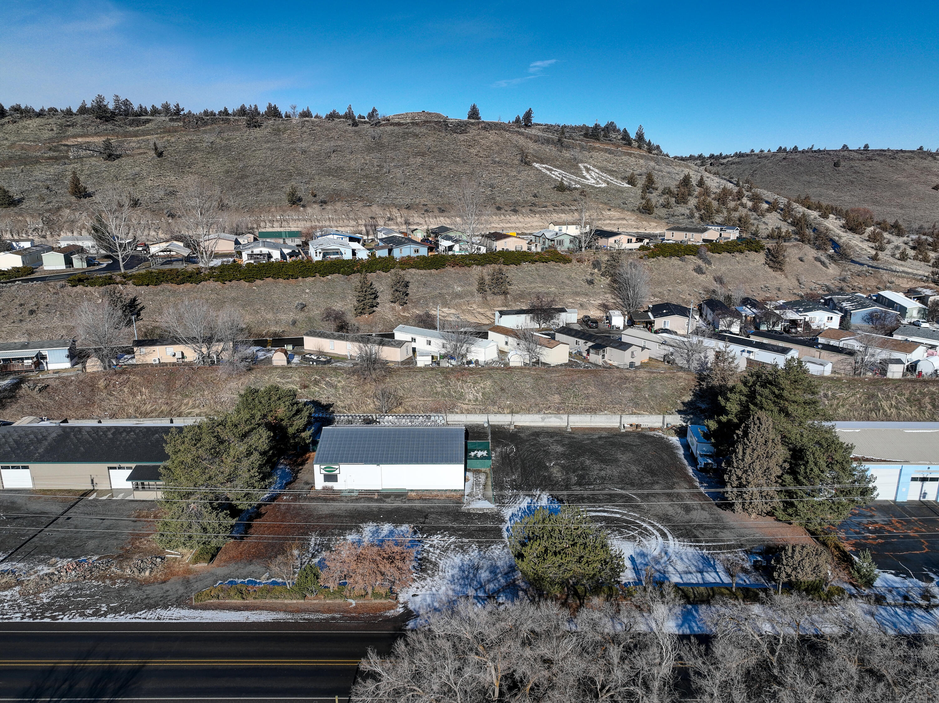 This is a great location never been offered on the market before. Well built for any commercial or retail application. Loading docks for trucks of all sizes. Plenty of room for truck parking and access. Could be a mechanic shop, retail store, or any other type of business. Schedule a showing today.