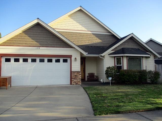 Beautiful home in a great neighborhood. Slab granite counter tops Cherry cabinets, vaulted ceiling, ceiling fans. Master bath has a tiled, walk-in shower. Covered patio, in ground sprinklers, mature landscaping.
