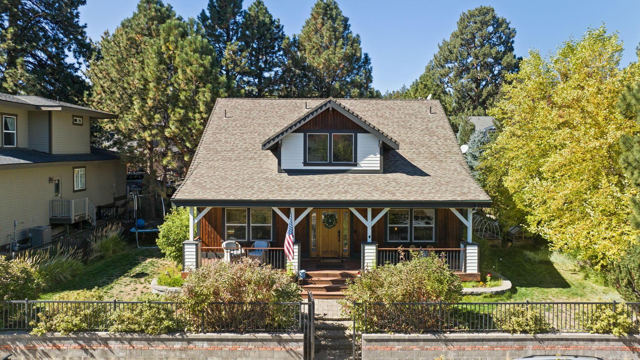 Located in Shevlin Ridge on Bend's Westside, this home delivers main-level living, flexible space, and strong long-term upside in one of the area's most established neighborhoods.  The kitchen features granite tile counters, stainless appliances, and ample cabinet storage, opening to a relaxed living area with gas fireplace, access to the paver patio, 2-car garage and alleyway. The dedicated office with built-ins and formal dining room provide functional versatility on the main level, along with a spacious suite offering a walk-in closet, dual vanity, soaking tub, and tiled shower. Upstairs includes two bedrooms, a full bath, and a large bonus room with a private balcony + ample storage that could serve as a fourth bedroom or media room. A great property to upgrade over time and make it your own. Close to trail systems, schools, parks, NWX, Mt. Bachelor, and downtown, this location blends outdoor access with high-end amenities and day-to-day convenience.