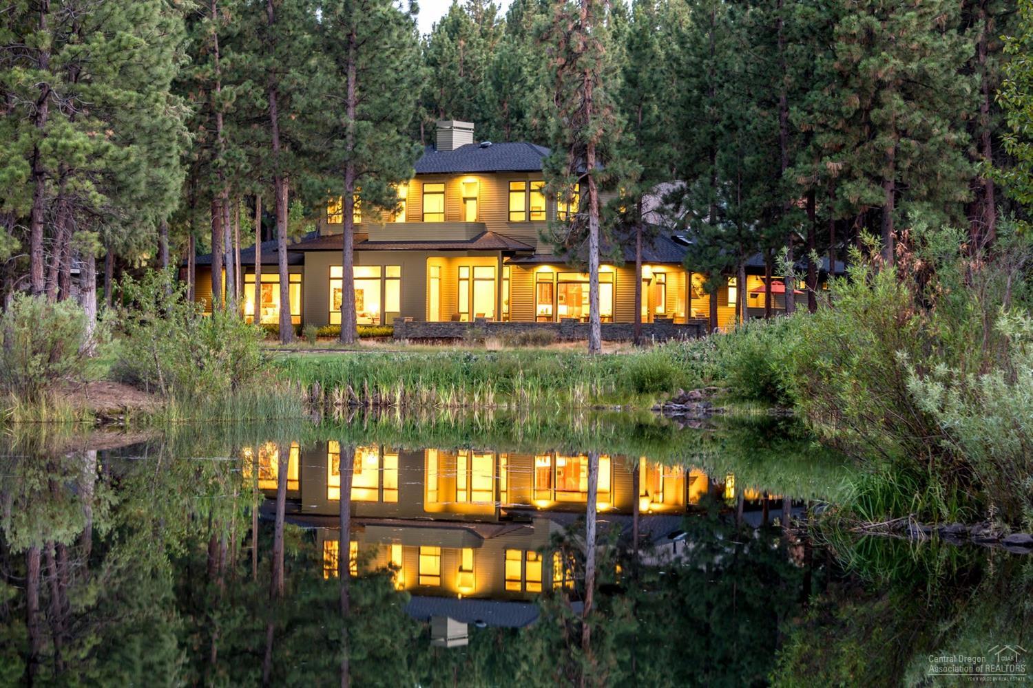 This Custom Hm was especially designed by Joey Shaw of Homeland Design who approach each job w/ a level of detail & artistic passion. From the entrance & throughout, your eyes will be drawn to the golf course & Lake in the gated community of Awbrey glen. A Contemporary yet Prairie Style Hm has Huge Main Floor Master w/ Fireplace, 2 En Suites & a very spacious 3 car garage. From a 1000 bottle wine cellar to a fabulous gourmet kitchen, you won't be disappointed in previewing this spectacular home.