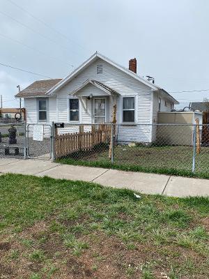 Investment property total remodel needed.  It has flooring down and bathroom is partially done.  Kitchen needs flooring and cabinets, and appliances.  This is being sold as is.