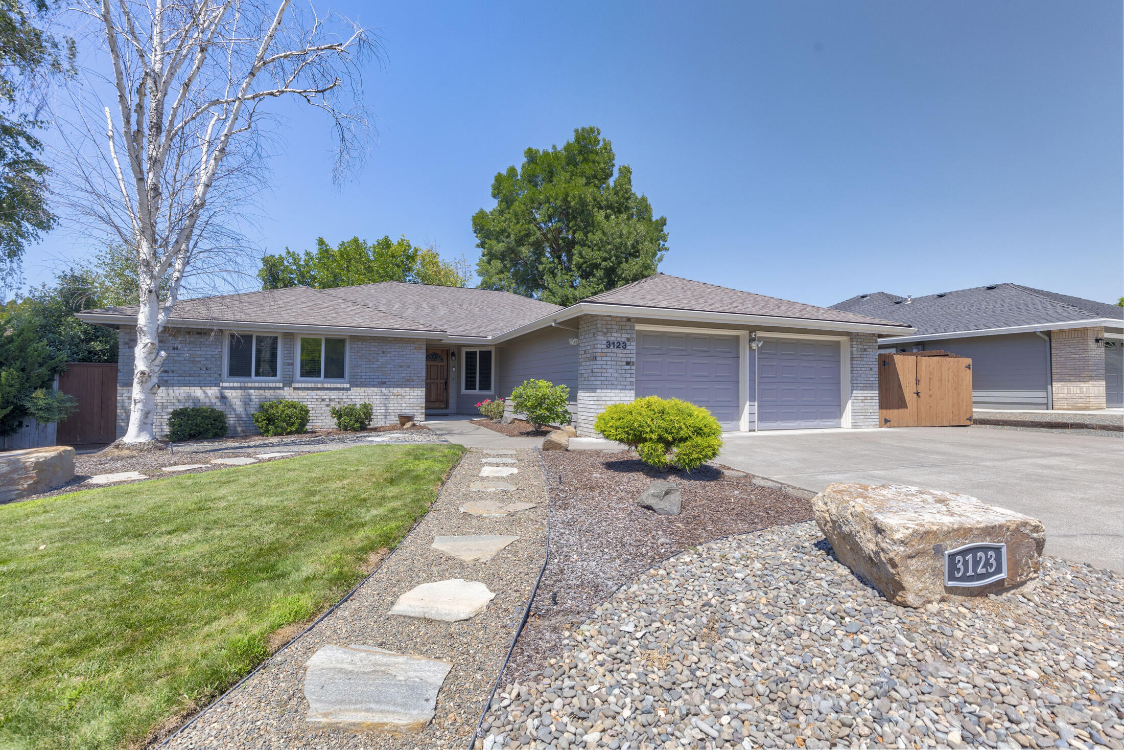Welcome Home! This very well maintained has 3 spacious bedrooms, 2 Full bathroom and sits in a nice neighborhood. The open floor plan is great for entertaining. with built in cabinets for display. The bedrooms are of good size.  The primary has a slider to the backyard. Also a covered deck area off the living room. A small water features adds to the tranquility. It has a large side yard for a small RV or Boat. A recent home inspection on file.