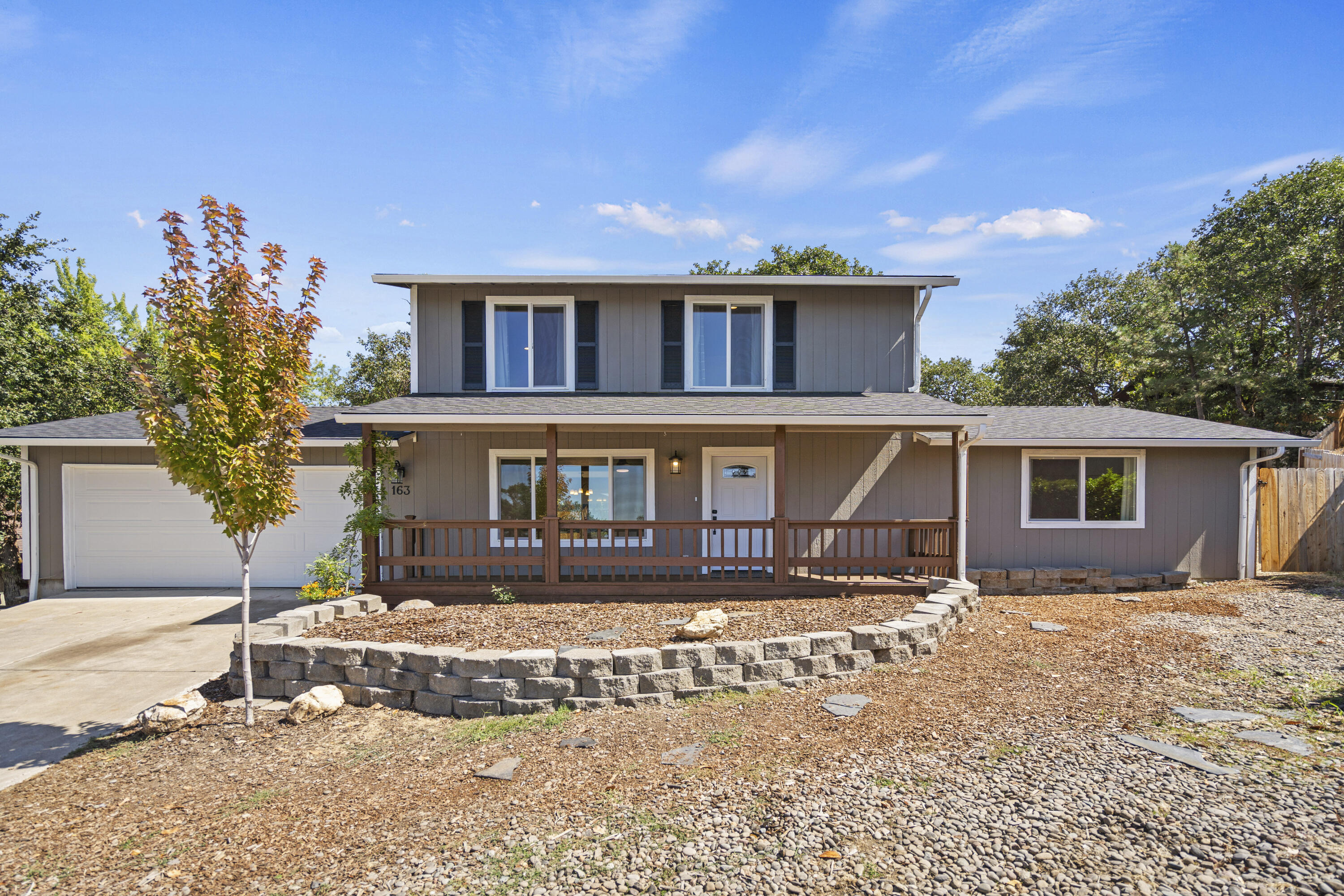 This warm and cozy two story home has been fully updated in the last two years
which includes remodeled kitchen and bathrooms, painted inside and out, new roof, new HVAC, and numerous other improvements. Located in a quiet cul-de-sac with easy access to HWY 62 to Medford. Great schools and a family friendly neighborhood. Raise your own chickens and eggs with a professionally built coop, all available on a large lot with new fencing. Come see what a wonderful opportunity this property presents.