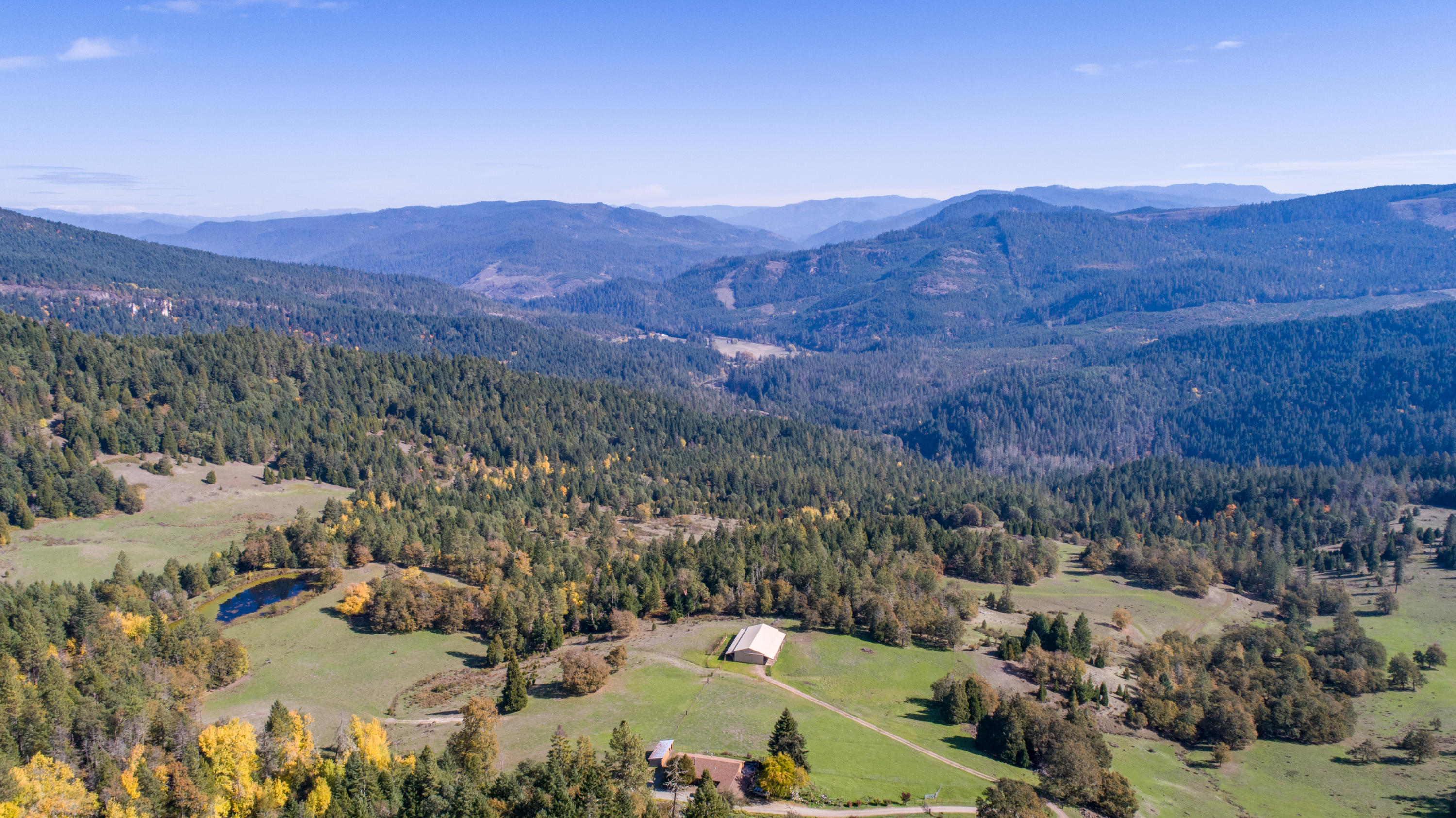 Very private 648 acre ranch in the Western Cascades. Features over 1.8 MBF of merchantable timber and (2) homes with outstanding views of the Umpqua National Forest. Diversified ranch for cattle, farming, timber, hunting and recreation. Situated at an elevation of 2,000 ft. The land has varying topography and a good trail system with timber, ponds, streams, meadows and water rights. Abundant wildlife with elk, deer, bear, cougar, turkey and quail. The perfect retreat from the urban rat race.