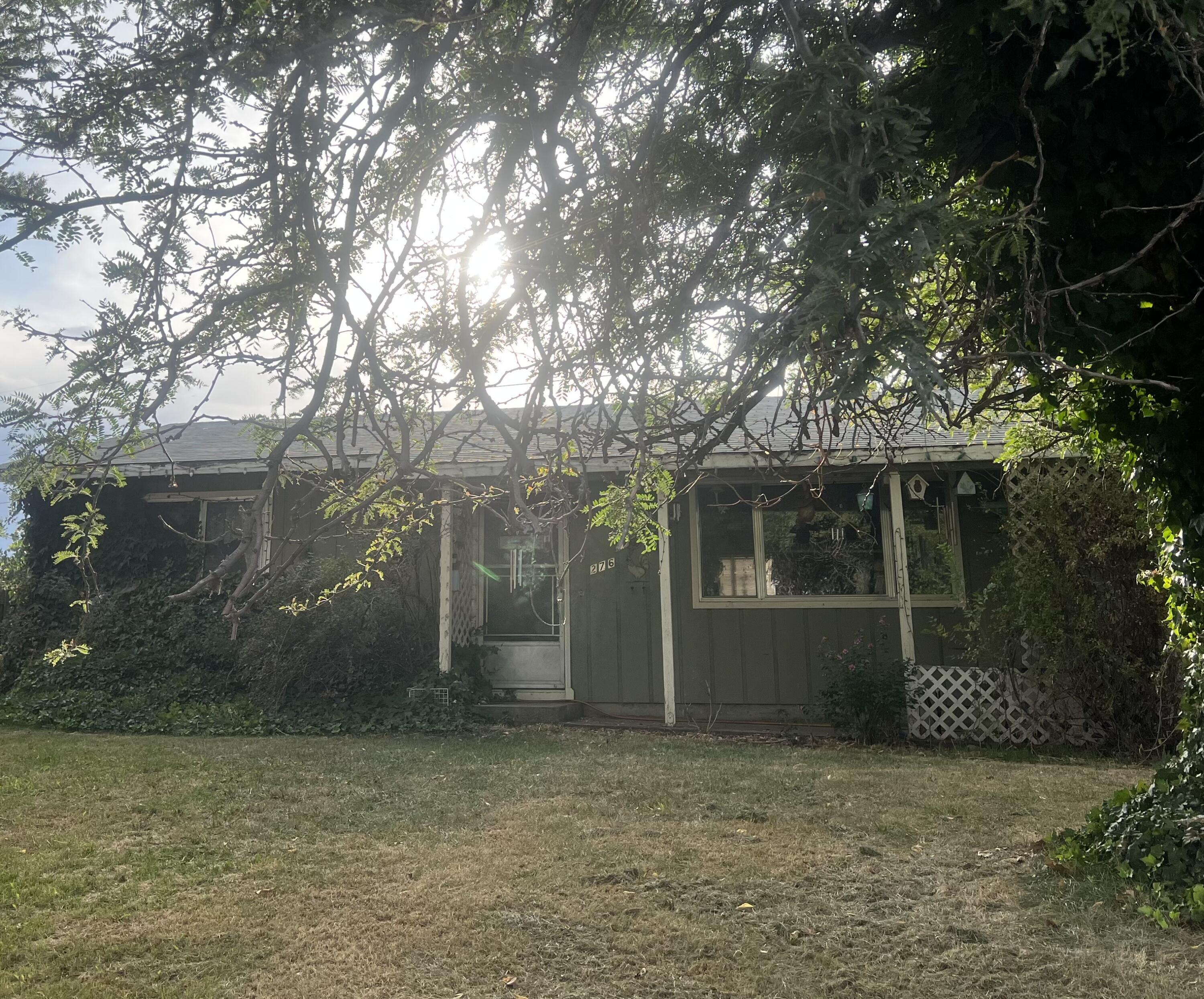 This 2-bedroom, 1-bath home, built in 1979, is full of character and ready for your personal touch. Owned for many years by one resident, it's been gently lived in and offers a great opportunity for renovation. Centrally located with easy access to shopping, dinning, schools, and major roadways, this home is perfect for those seeking convenience. The layout includes a cozy living space, a functional kitchen, and two bedrooms. The bathroom is clean and simple, awaiting modern updates. the property sits on a generous lot with plenty of space for outdoor living, gardening, or future enhancements. whether you're a first-time buyer, or looking to downsize and customize, this home offers solid potential in a great location.