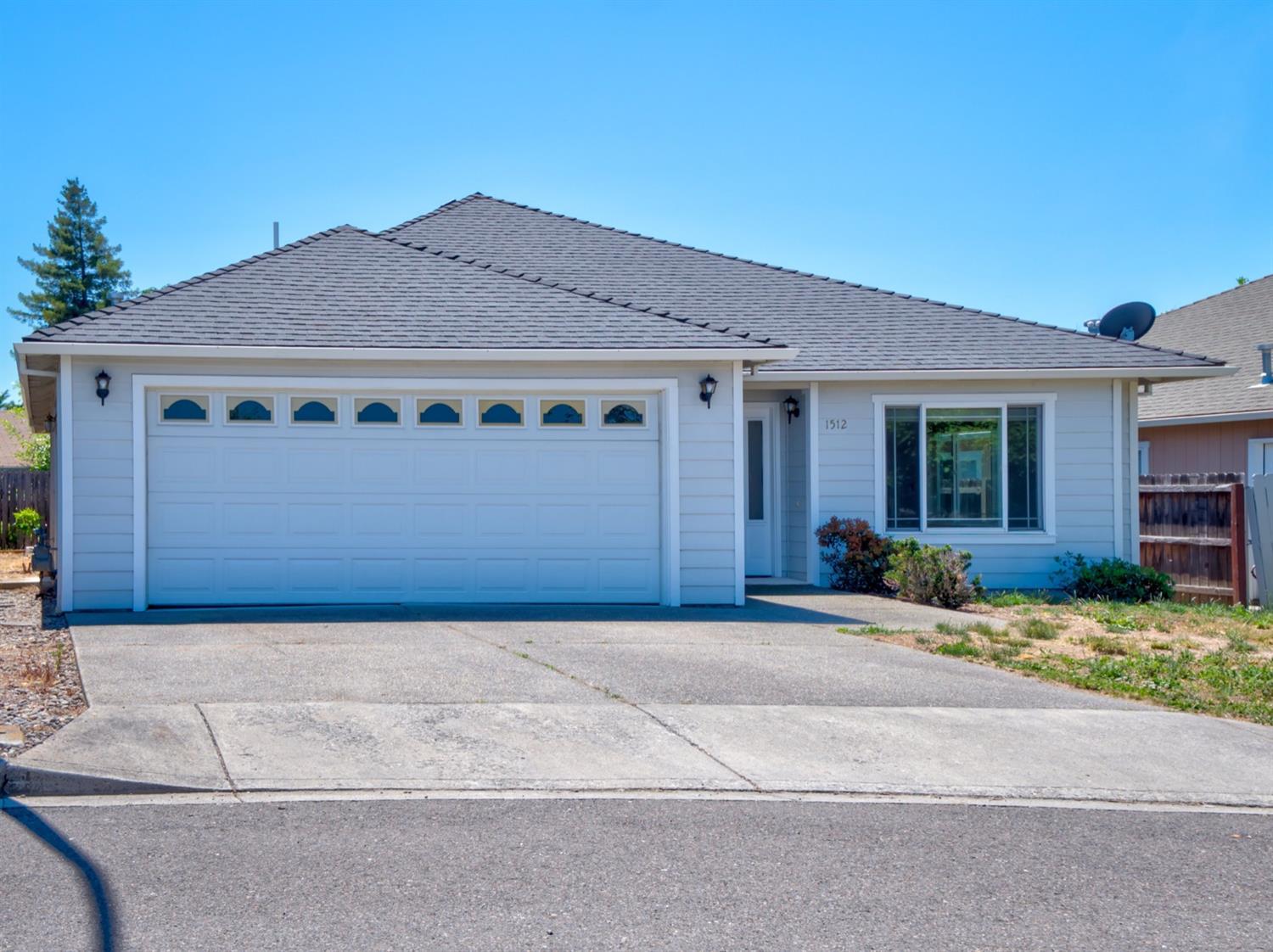 This lovely single-story East Medford 3-bedroom/2-bathroom home was built in 2002 and has been recently remodeled with new interior paint, new light fixtures, new carpet and new appliances. The living room is spacious with coffered ceilings and a gas fireplace. Master bedroom is large with a walk-in closet, ensuite bath and door leading out to backyard. The covered patio overlooks the low-maintenance yard and the attached two-car garage provides ample storage. Home is centrally located, close to schools, shopping and restaurants. All this on a quiet, cul-de-sac street with no through traffic. Ready for immediate occupancy, come tour today!