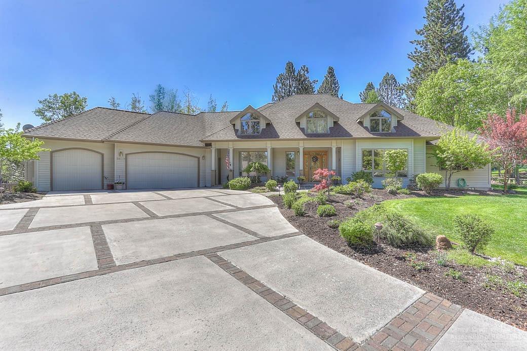 Great Mtn High Home in SE Bend! One of the biggest lots in Mtn High this 3Bd+Office/3Ba has tiled entry, great room w/HW floor, bay window, open kitchen w/slab-Quartz, B-Bar & Nook, pantry, formal dining w/HW floor, big main level master w/sitting area, jetted tub + shower & walk-in, pro-office/4th bed, huge laundry/craft room w/wash basin, sep front room w/gas log stove, 3-car att garage w/great storage, huge backyard w/patio & deck w/arbor & water feature, gas FA heat + Central AC, all on 0.58 acre lot!