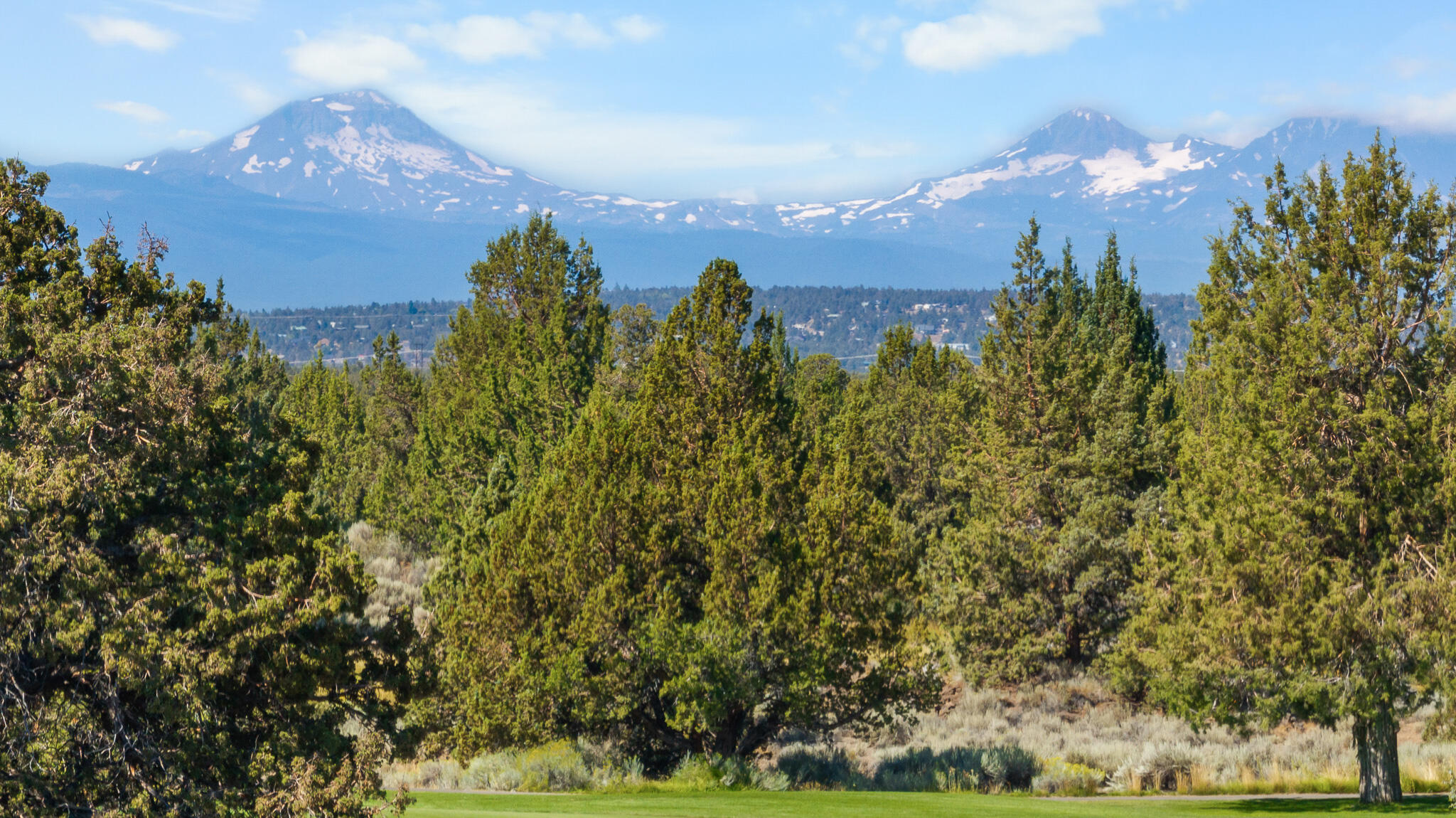 Welcome to Juniper Preserve, your golf and wellness sanctuary. Juniper Preserve features multiple restaurants, 2 championship golf courses (Fazio and Nicklaus), fitness facilities, spa, pickleball court, playground, golf academy, access to bike trails, and a newly opened market. This flat lot backs to #17 on the Fazio course and has fantastic golf/mountain views that add to this premium location. It's close to the heart of the resort that you can escape for a quick trip to enjoy all the amenities but at the end of Ghost Tree Ct so you get that private feel. This lot can be purchased in combination with lot 316 to build a larger home or get a bit more elbow room. Purchase will include Pronghorn club membership fee.