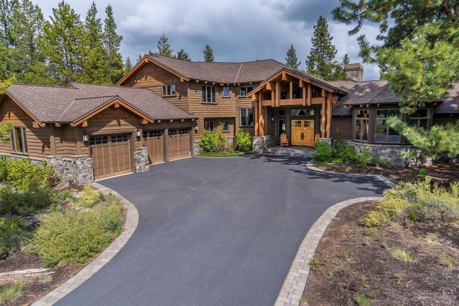 STUNNING home on large lot with privacy in Caldera Springs. Pride of home ownership is obvious in this luxurious residence. Perfect indoor-outdoor entertaining space for large gatherings. You feel as though you are in your very own ski lodge with gorgeous wood trusses that run from the exterior to the interior. Two beautifully decorated, large master suites on main level. Caldera Springs is a partially gated community that boasts links style golf course with a quarry pool overlooking a boat friendly lake.
