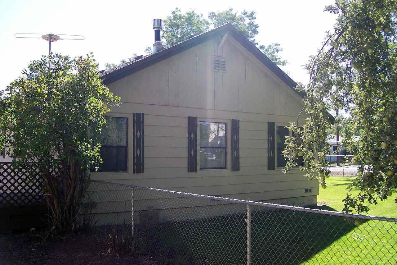 Solid Home In Move In Condition. Cozy Home With An Open Floor Plan, Large Living Room With New Gas Burning Stove. Cute Kitchen With Appliances, Lots Of Storage. Big Back Deck To Enjoy With The Family. The Yard Has Inground Sprinklers In The Front Section, Mature Landscaping Provides Privacy. Rv Parking, Wrap Around Driveway To Easily Get In And Out. New Paint, 700 Square Feet Garage/Shop. Inspections Have Been Done.