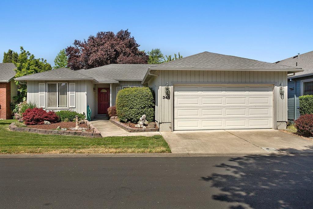 Single level home in Oak Valley 55+ community. Pool and clubhouse access. 3 bedroom, 2 full bath and 1379 square feet. Living room has vaulted ceiling, gas fireplace and ceiling fan. Fenced backyard, storage shed and sprinkler system. Gas forced air heat and central AC. Two car attached garage. HOA dues are $160/month. Close proximity to freeway access and Ashland.