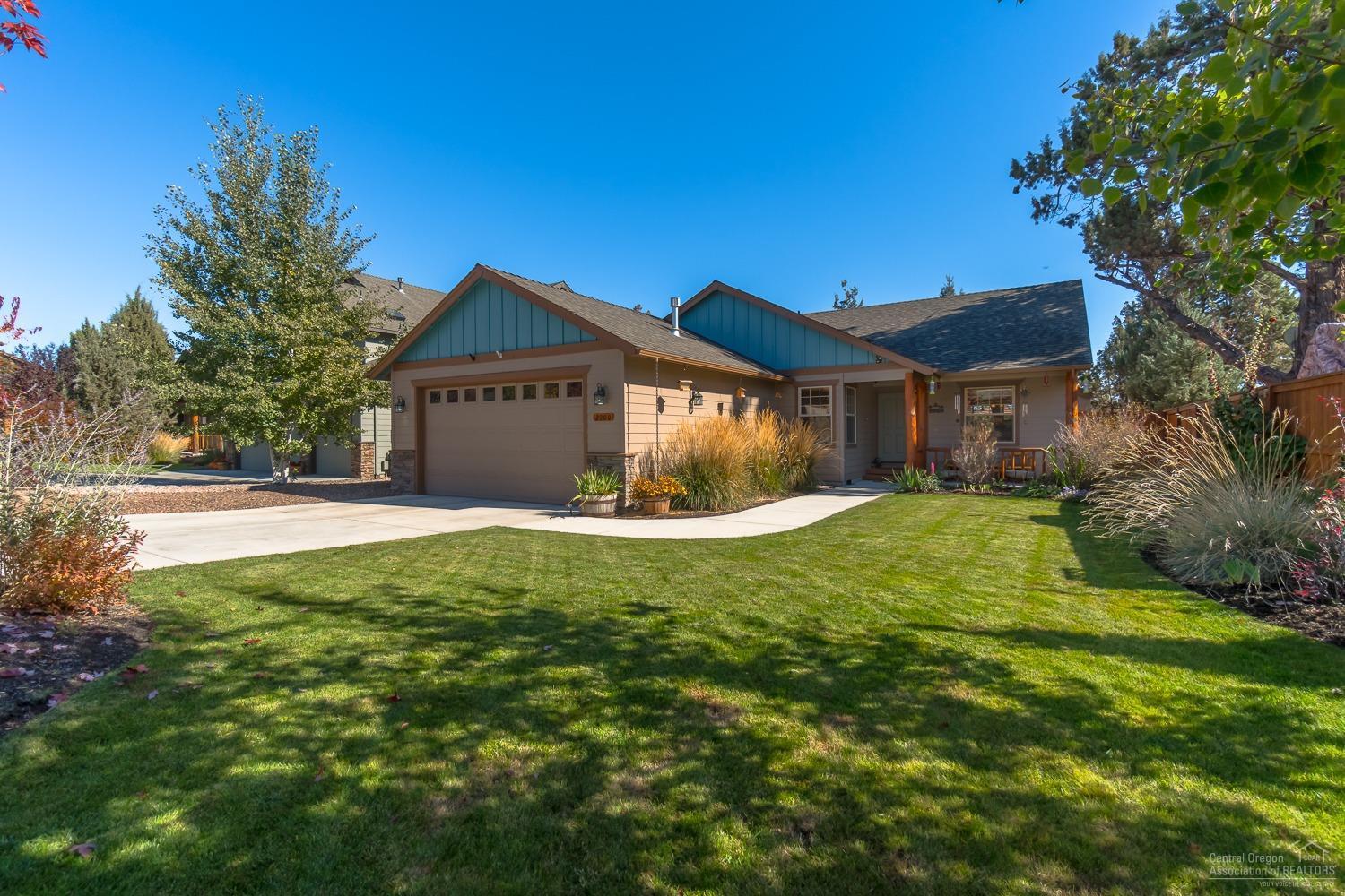 Hard to find, 4 bedroom single level beauty is close to town and has easy access to Bend. Fully landscaped front and back yards, with auto sprinklers and backs to an empty field with mature trees. The backyard features a raised flower bed, berry vines and fruit trees as well as an expansive entertaining area and firepit, where you can relax. There are beautiful log accents inside and outside of the home. Cozy up to the gas fireplace this winter and cool down with a/c during the summer heat. Home has a full ADT security system and surrounding motion sensor lights.